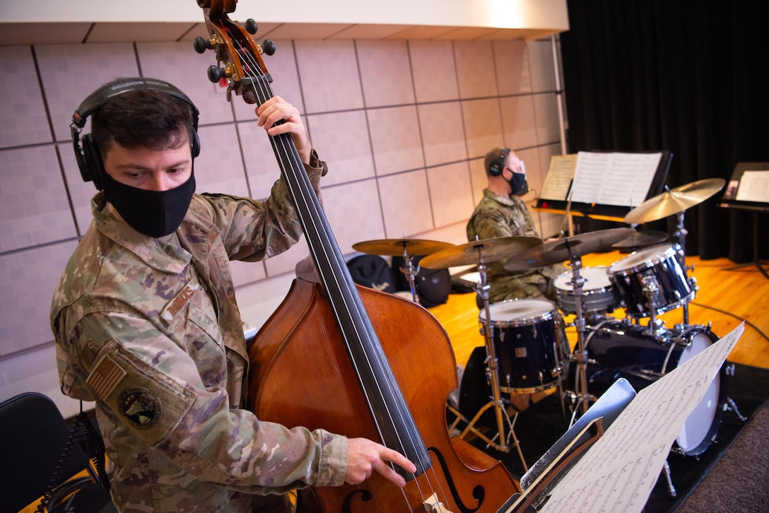 Bassist, Technical Sgt. Benjamin Thomas, and Percussionist, Master Sgt. David McDonald earnestly rehearse for the first-ever Jazz Heritage Series video recording project. (U.S. Air Force photo by Chief Master Sgt. Kevin Burns)