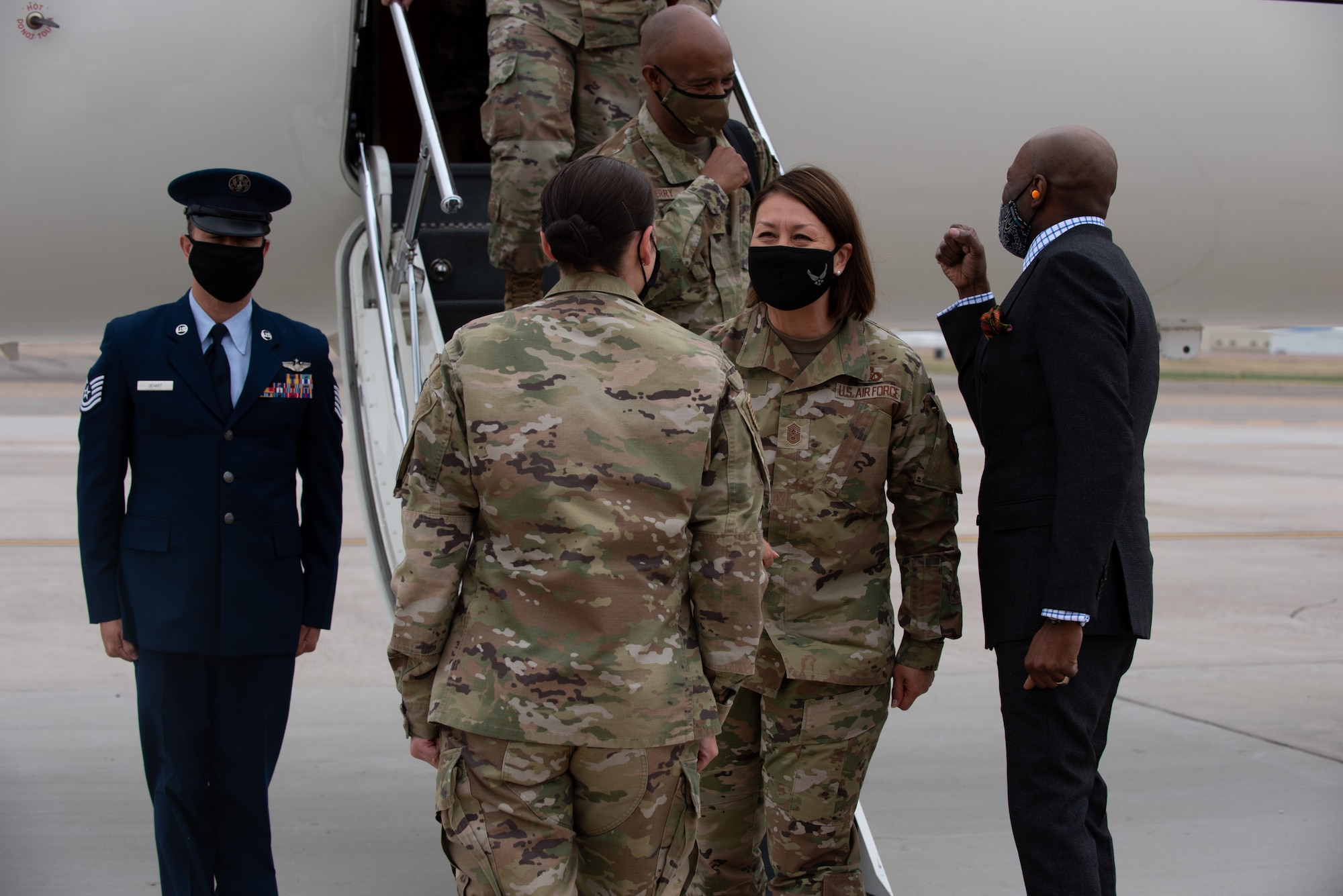 Chief Bass is greeted by Master Sgt. Ruhlman