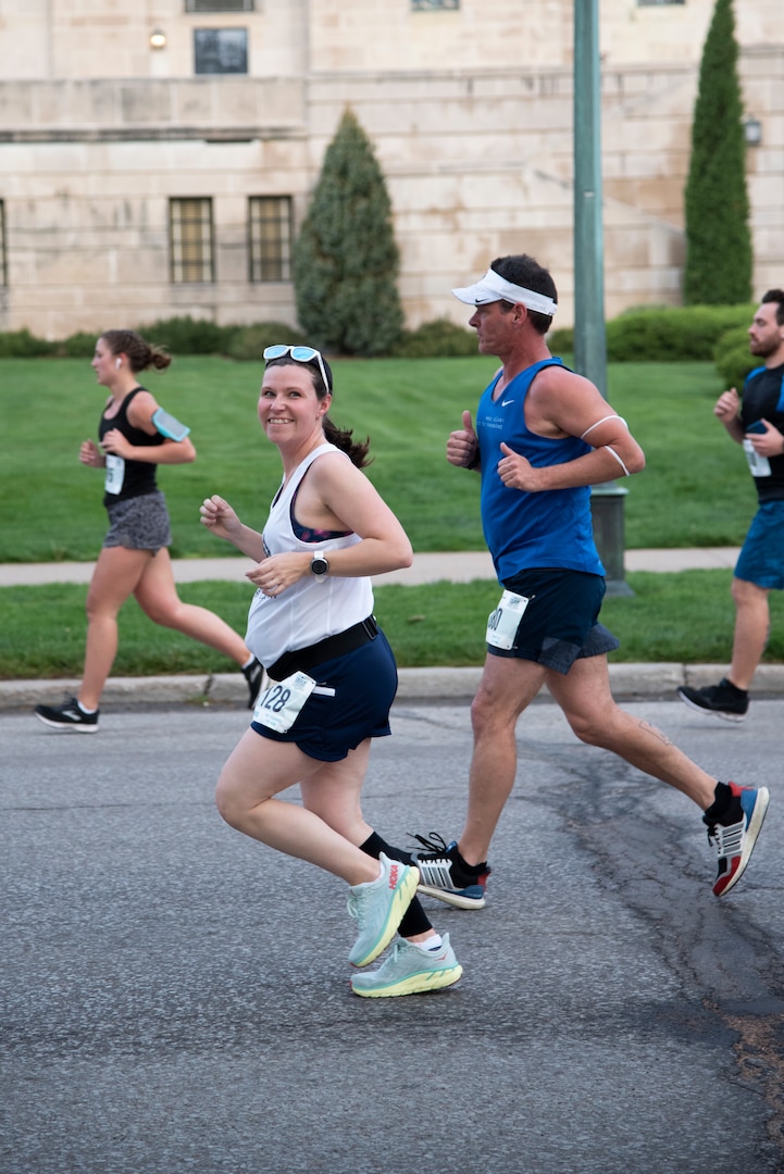 1st Lt. Brittany Downs, an engineer officer with the 945th Engineer Company of the Ohio Army National Guard, runs in the Lincoln Half-Marathon, in Lincoln, Nebraska, May 2, 2021.