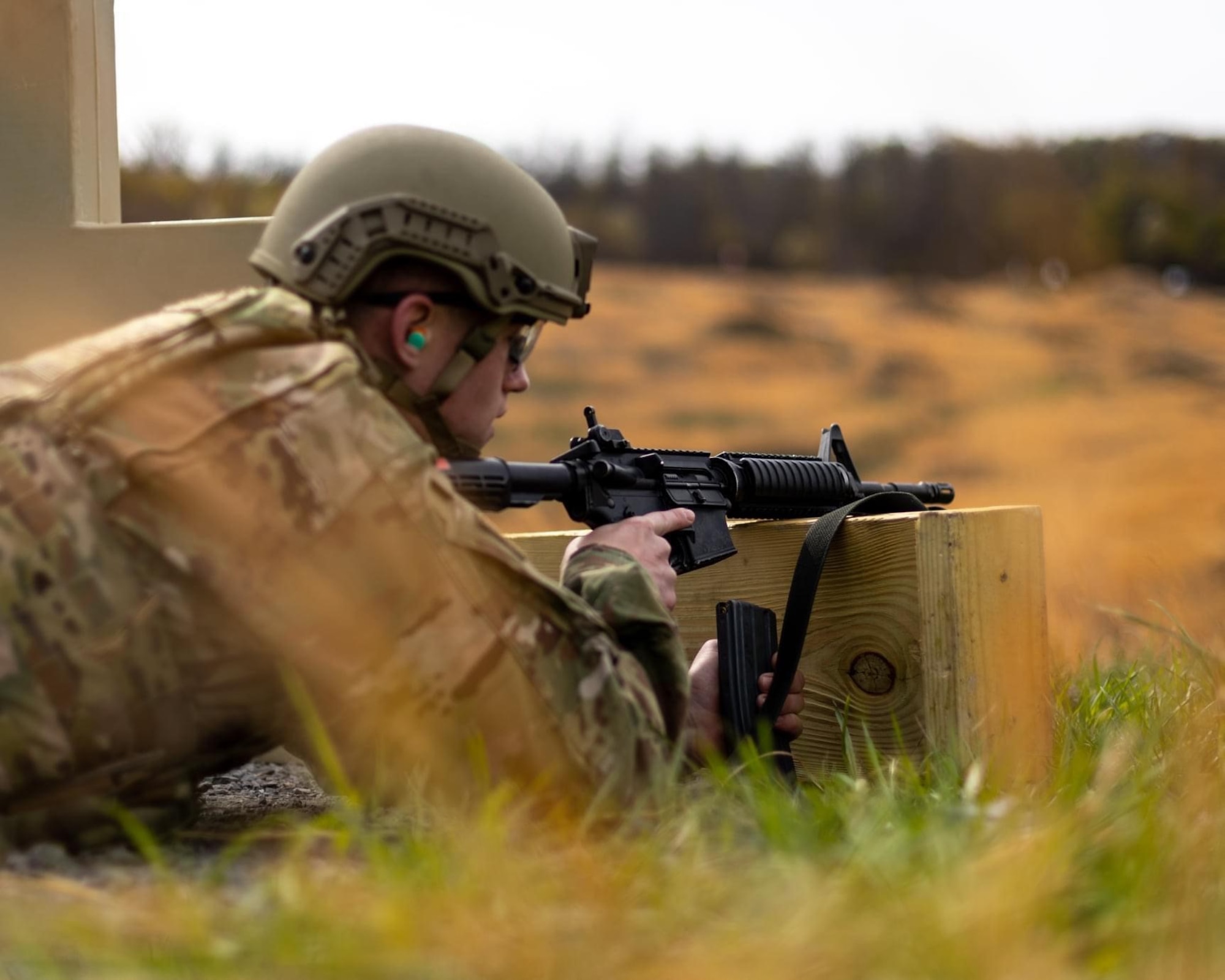 U.S. Air Force Airman 1st Class Ethan Wilson, a security forces specialist for the 167th Airlift Wing, reloads an M4 rifle during a live fire event at the 2021 West Virginia Best Warrior competition at Camp Dawson in Kingwood, West Virginia, Apr. 23, 2021. The firing events utilized pop-up targets instead of paper targets that the Air Force is trained on.