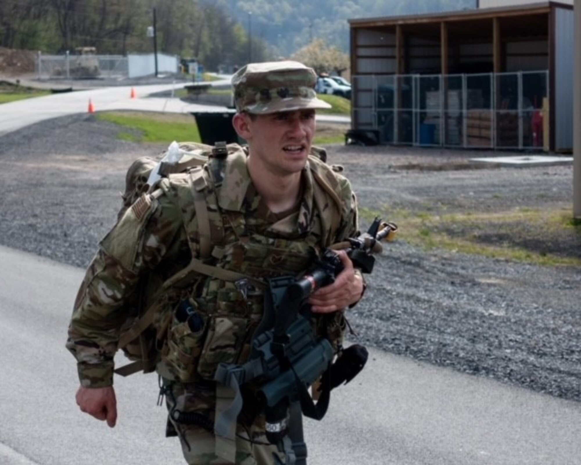 U.S. Air Force Staff Sgt. Anthony Zygmunt, a security forces specialist for the 167th Airlift Wing, competes in the six-mile ruck march event at the 2021 West Virginia Best Warrior competition at Camp Dawson in Kingwood, West Virginia, Apr. 23, 2021. The ruck march was timed and was the first of many events at the competition