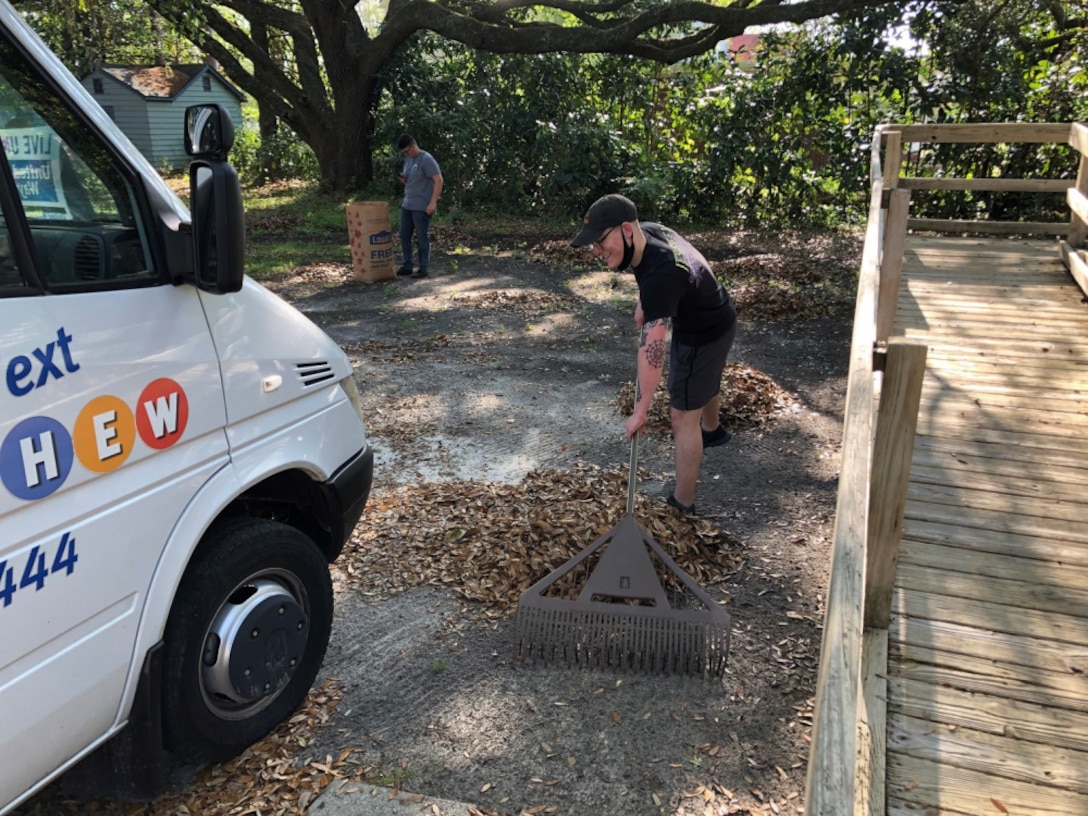 U.S. Marines with 8th Communication Battalion, II Marine Expeditionary Force Information Group, helped with yard work for Children Healthily Eating on Weekends (CHEW) in Jacksonville, N.C., April 14, 2021. CHEW gave the Marines an opportunity to volunteer and build relations and give back within their community.