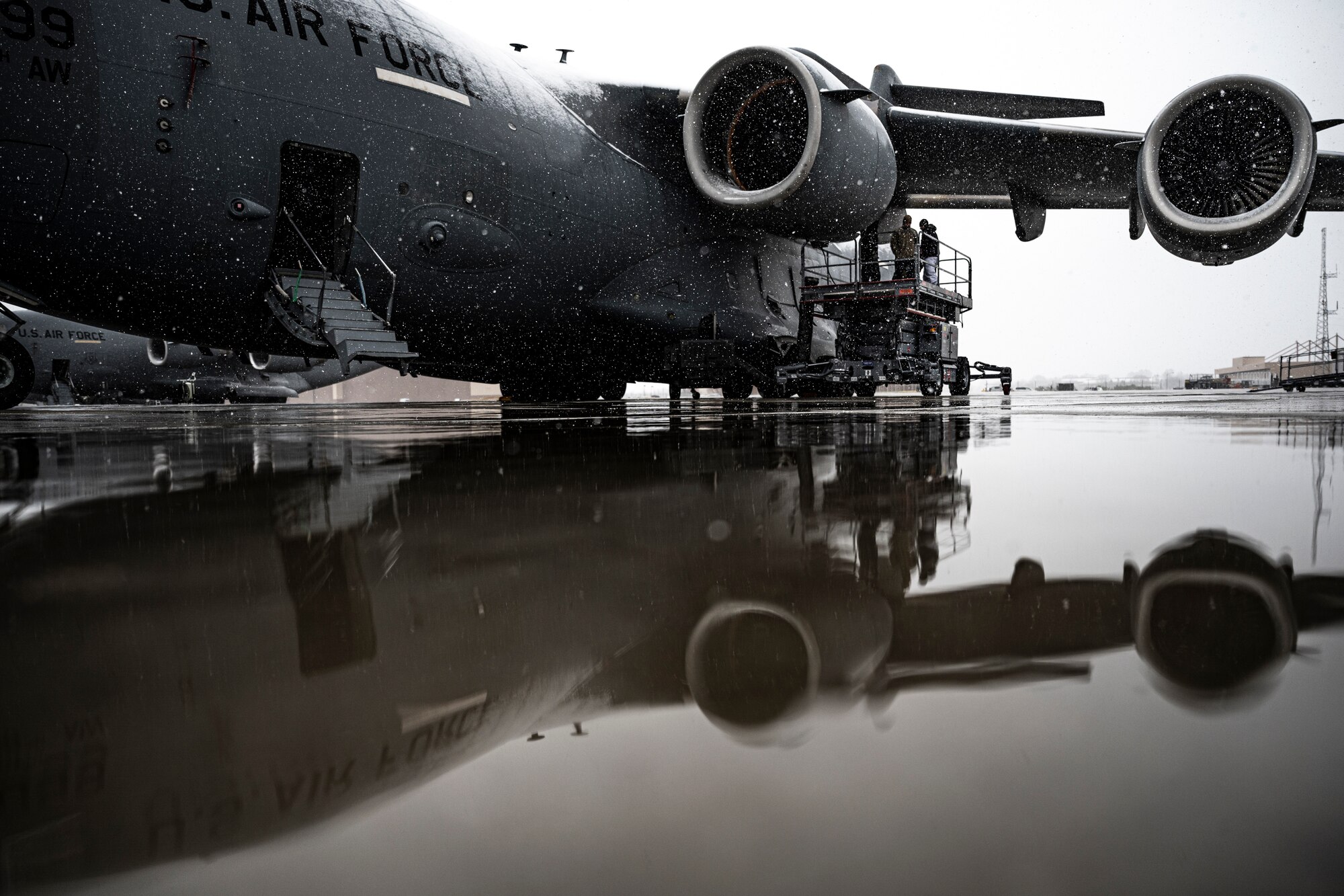 Airmen assigned to the 911th Aircraft Maintenance Squadron prepare to conduct maintenance on a C-17 Globemaster III engine at the Pittsburgh International Airport Air Reserve Station, Pennsylvania, April 1, 2021.
