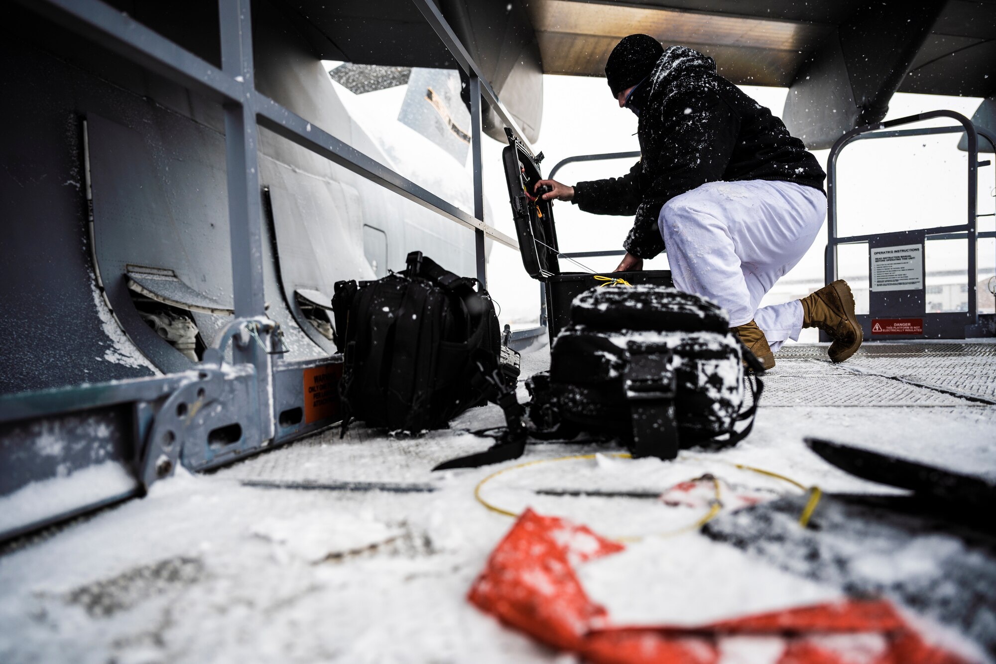 Senior Airman Tom King, 911th Aircraft Maintenance Squadron aerospace propulsion technician, gathers tools while preparing to conduct maintenance on a C-17 Globemaster III engine at the Pittsburgh International Airport Air Reserve Station, Pennsylvania, April 1, 2021.