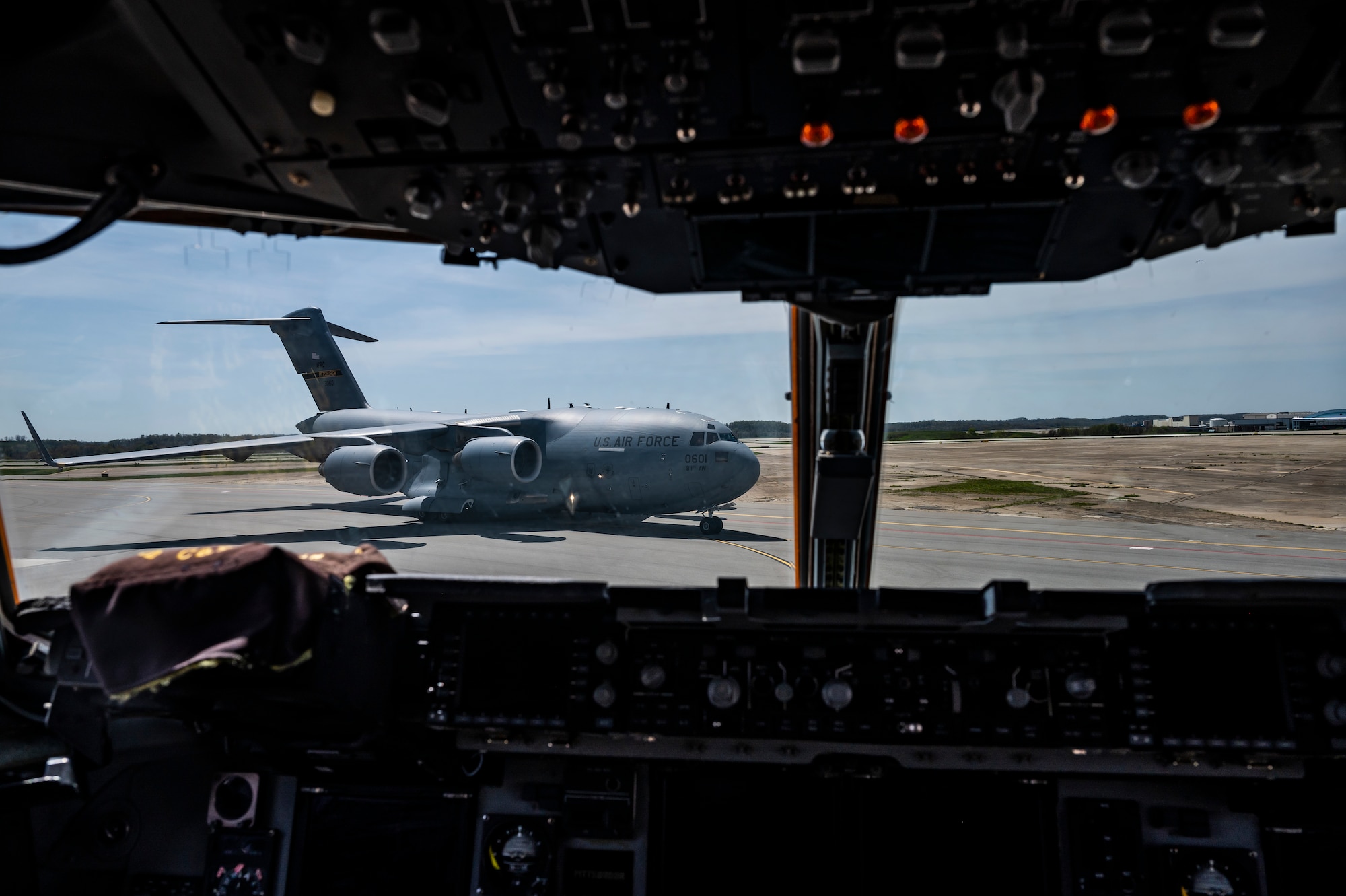 A C-17 Globemaster III assigned to the 911th Airlift Wing taxis on the flight line after completing a routine training mission at the Pittsburgh International Airport Air Reserve Station, Pennsylvania, April 27, 2021.