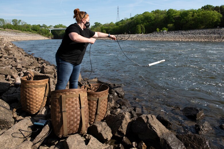 Sarah Pedrick, biologist in the U.S. Army Corps of Engineers Nashville District’s Water Management Section, puts a water quality instrument into the tailwater of the Stones River below J. Percy Priest Dam in Nashville, Tennessee April 27, 2021 while verifying the accuracy following recent calibrations. (USACE Photo by Lee Roberts)