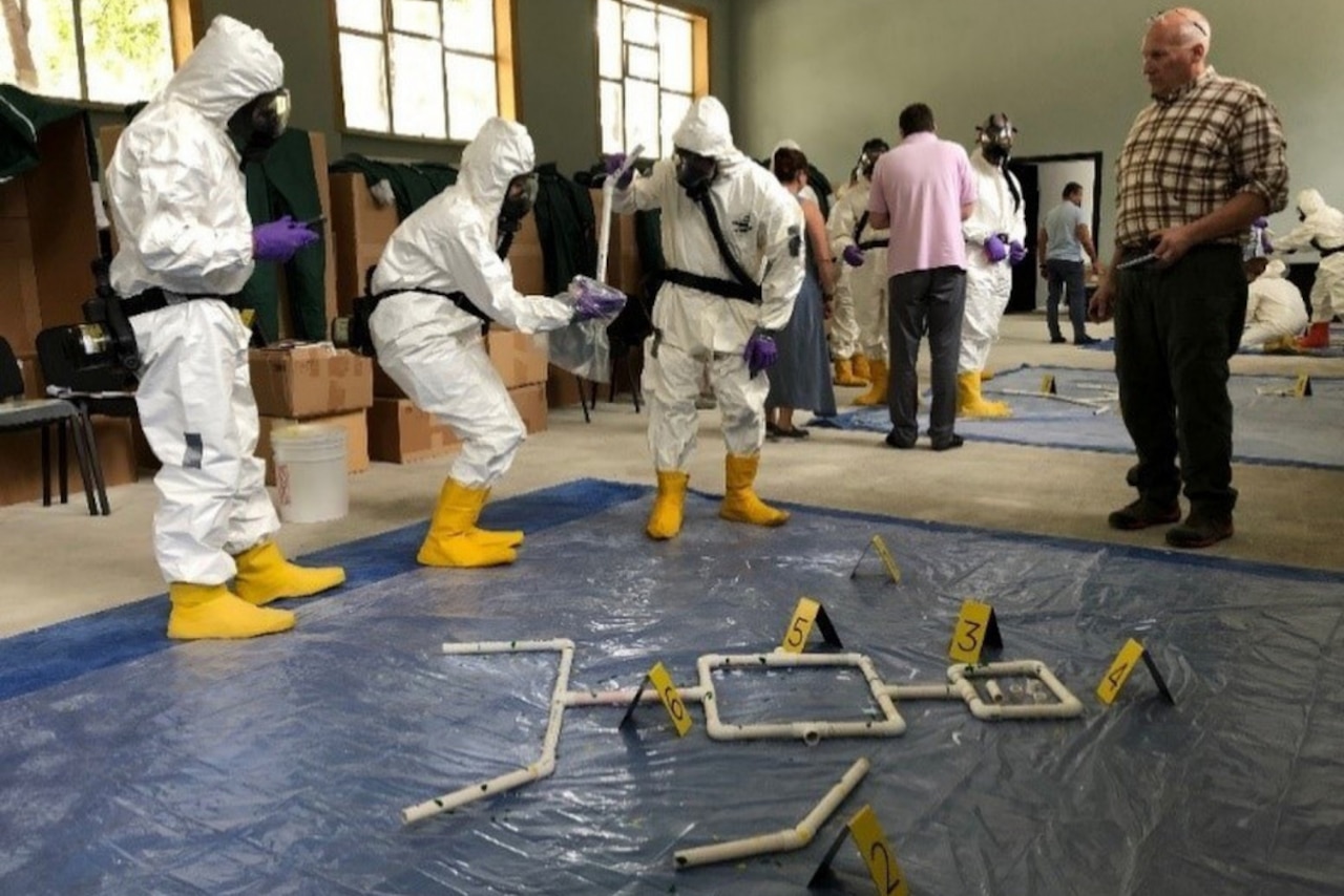 A Defense Threat Reduction Agency weapons of mass destruction crime scene operations course is shown.