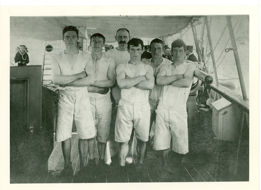 "USRC Manning's raceboat crew (1902-1904) which used the Corwin's Gig now a classic. Left to right: Seaman 'Frenchie' Martinesen, Master-at-Arms Stranberg (Coxswain), Seaman Andreas Rynberg, Magnus Jensen, and Franze Rynberg."