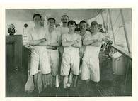 "USRC Manning's raceboat crew (1902-1904) which used the Corwin's Gig now a classic. Left to right: Seaman 'Frenchie' Martinesen, Master-at-Arms Stranberg (Coxswain), Seaman Andreas Rynberg, Magnus Jensen, and Franze Rynberg."