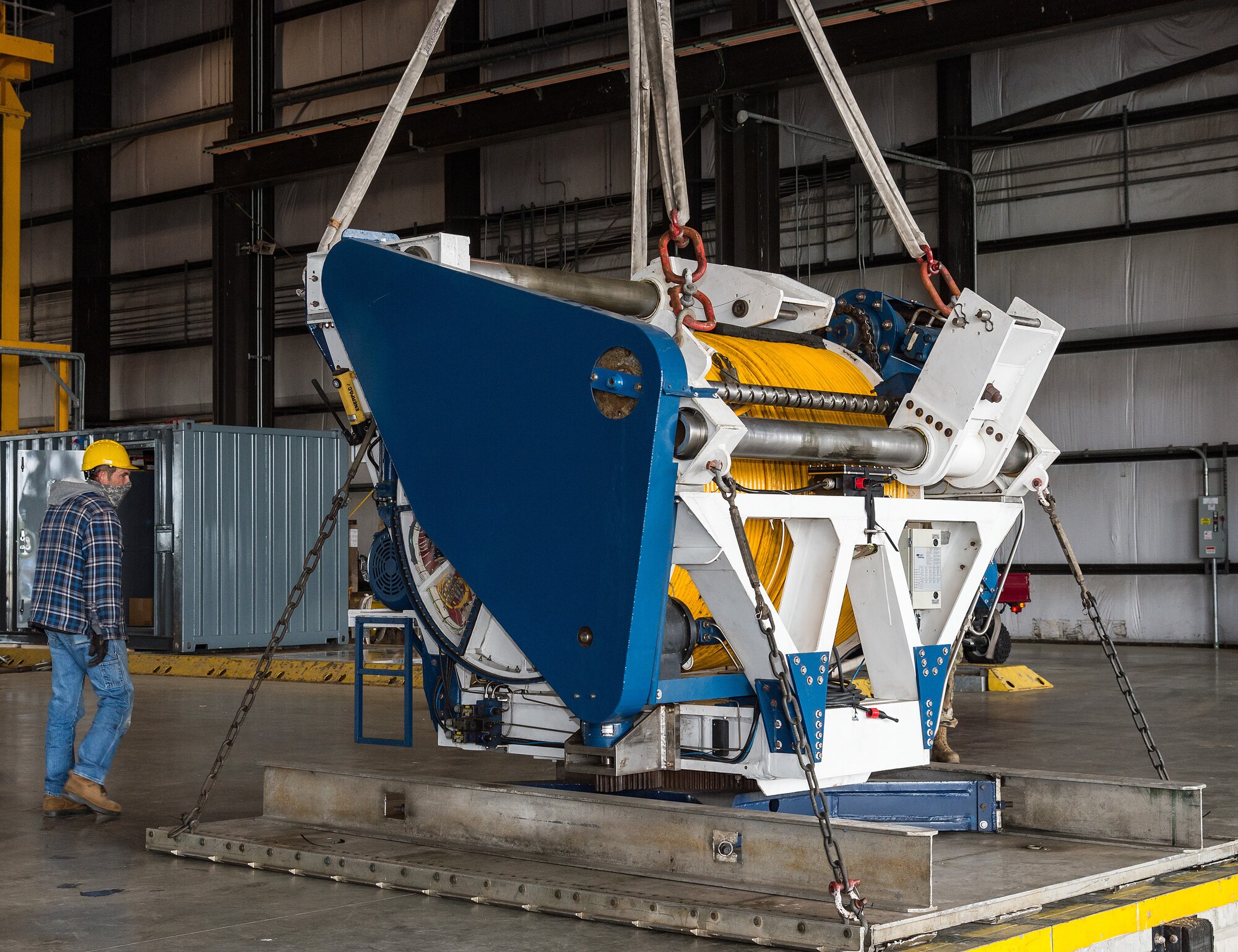 Members of the 436th Aerial Port Squadron unload cargo at Dover Air Force Base, Delaware, April 22, 2021. The cargo was flown to Indonesia to support search and rescue efforts for an Indonesian navy submarine. Indonesia is a vital partner in the Indo-Pacific region. (U.S. Air Force photo by Roland Balik)