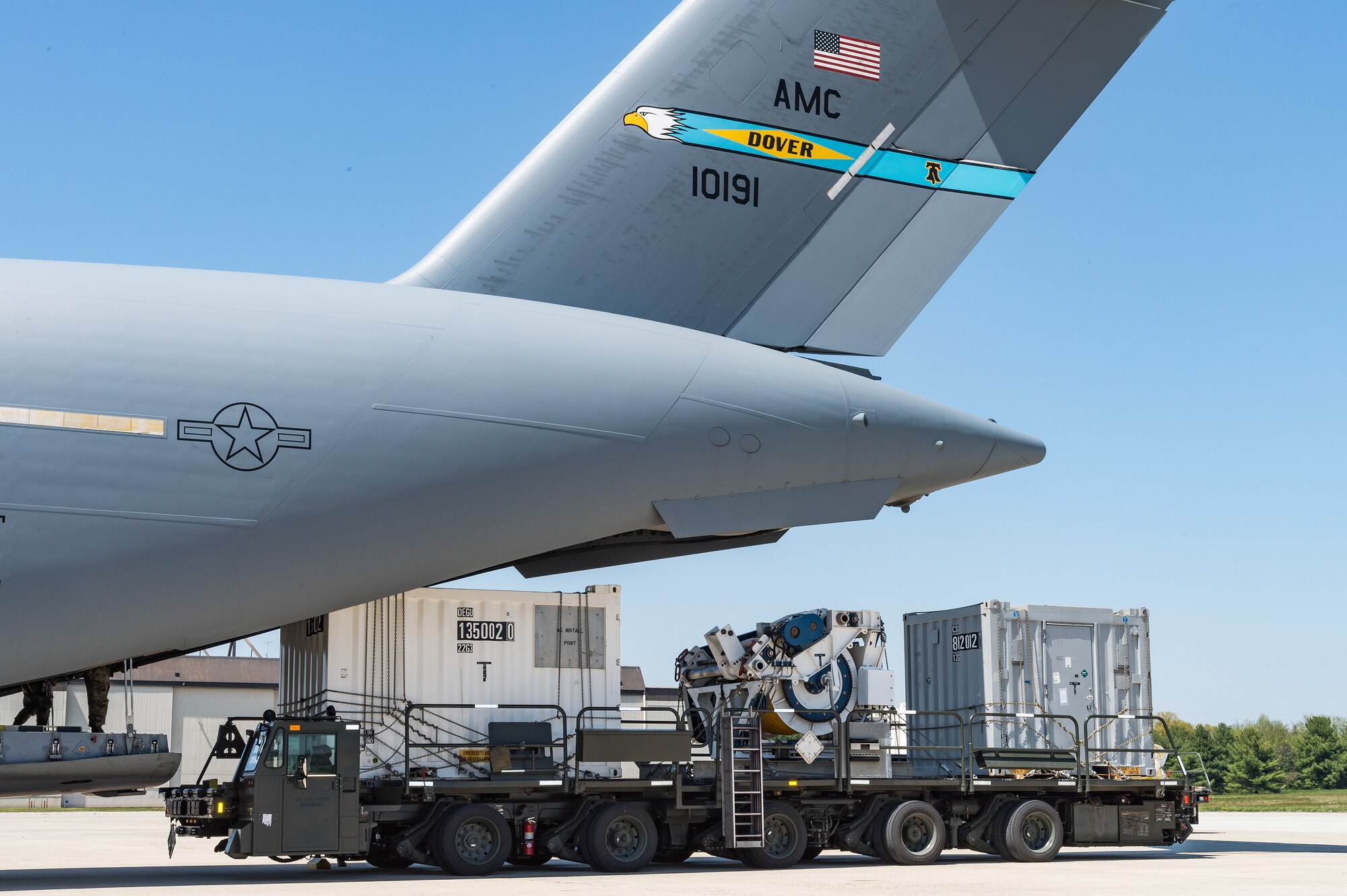Airmen from the 436th Aerial Port Squadron load cargo onto a C-17 Globemaster III at Dover Air Force Base, Delaware, April 23, 2021. The 436th APS is the largest aerial port in the Department of Defense. (U.S. Air Force photo by Roland Balik)