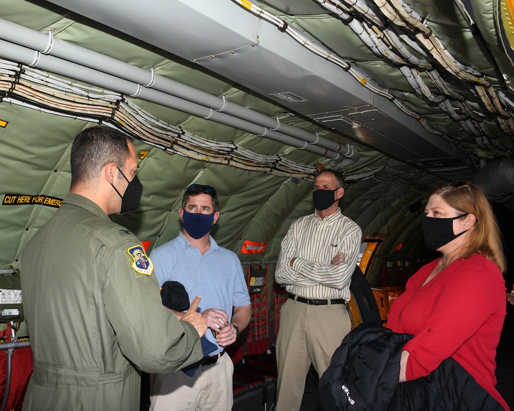 Col. Daniel Menashi gives a pre-flight briefing to congressional staff members (from left to right) Phil McNaughton, Dave Sienicki and Kelly Goggin, prior to take off May 4, 2021, at Joint Base Andrews, Md. The congressional staff members visited the wing to observe an air refueling mission with an E-8C Joint STARS aircraft. (U.S. Air Force photo by Staff Sgt. Cierra Presentado/Released)