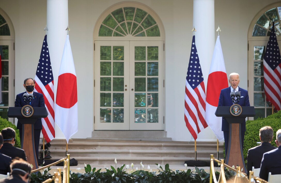 Japan's Prime Minister Yoshihide Suga and U.S. President Joe Biden hold a joint news conference in the Rose Garden at the White House in Washington, April 16, 2021.