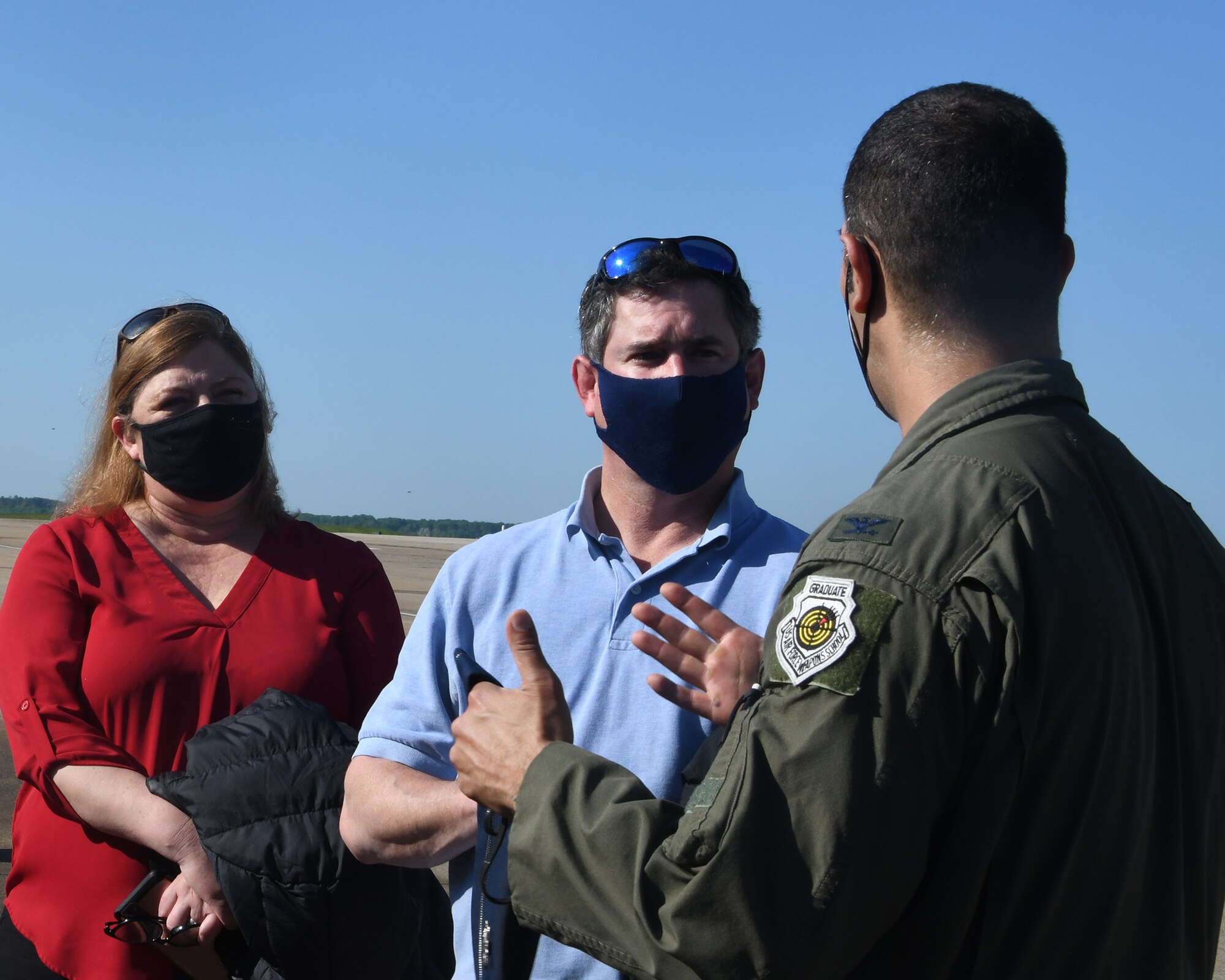 Col. Daniel Menashi, 459th Operations Group Commander, speaks with congressional staff members Kelly Goggin and Phil MacNaughton prior to boarding an Air Force Reserve KC-135 Stratotanker May 4, 2021, at Joint Base Andrews, Md. The congressional staff members visited the wing to observe an air refueling mission with an E-8C Joint STARS aircraft. (U.S. Air Force photo by Staff Sgt. Cierra Presentado/Released)