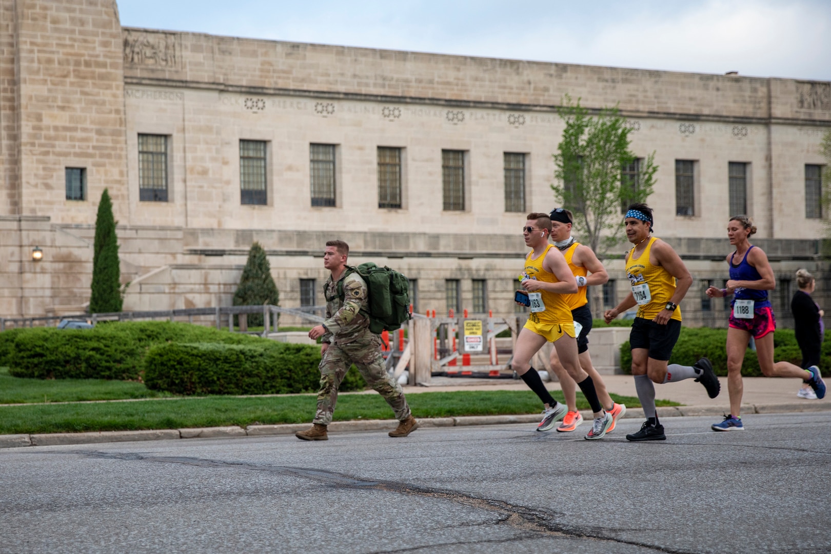 National Guard members run in front of the Nebraska State Capitol building on Sunday, May 2, 2021, during the annual Lincoln Marathon.