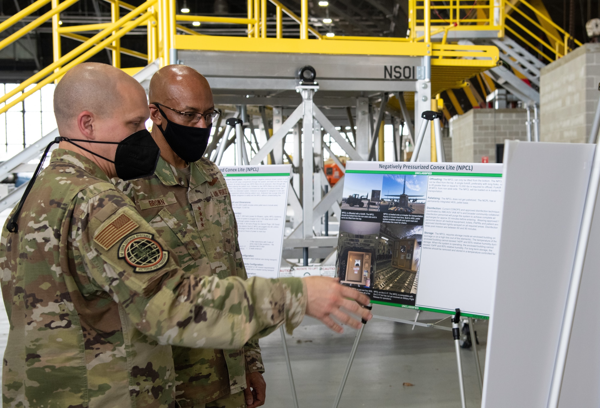 U.S. Air Force Lt. Col. Paul Hendrickson, Air Force CBRN Defense systems material leader, speaks to Air Force Chief of Staff Gen. Charles Q. Brown, Jr.,on Scott Air Force Base, Illinois, April 27, 2021. They discussed the joint urgent operational need, fielding laydown and sustainment of the Negatively Pressurized Conex Lite. (U.S. Air Force Photo by Airman 1st Class Shannon Moorehead)
