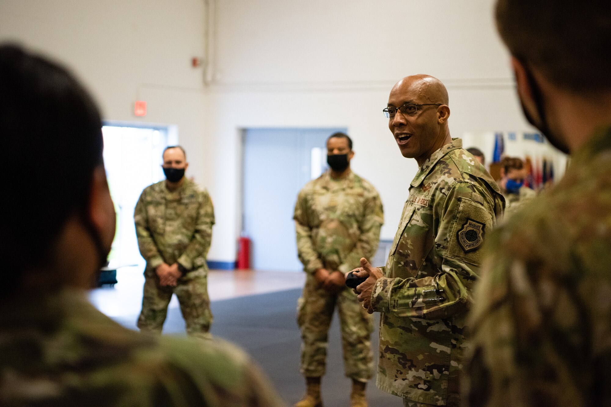 U.S. Air Force Chief of Staff Gen. Charles Q. Brown, Jr., talks with the Scott Air Force Base Honor Guard during his visit at Scott Air Force Base, Illinois, April 28, 2021. The Scott AFB Honor Guard is the third busiest Air Force Honor Guard in the United States, and they showcased to Brown how they utilize and train their Airmen. (U.S. Air Force photo by Airman 1st Class Isaac Olivera)