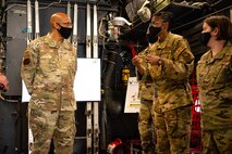 U.S. Air Force Lt. Col. Ericka Smith, 375th Aeromedical Evacuation Squadron chief nurse, briefs Air Force Chief of Staff Gen. Charles Q. Brown, Jr., during his visit at Scott Air Force Base, Illinois, April 27, 2021. The 375th AES briefed about their training capabilities, providing world-wide support and how they utilize their equipment. (U.S. Air Force photo by Airman 1st Class Isaac Olivera)