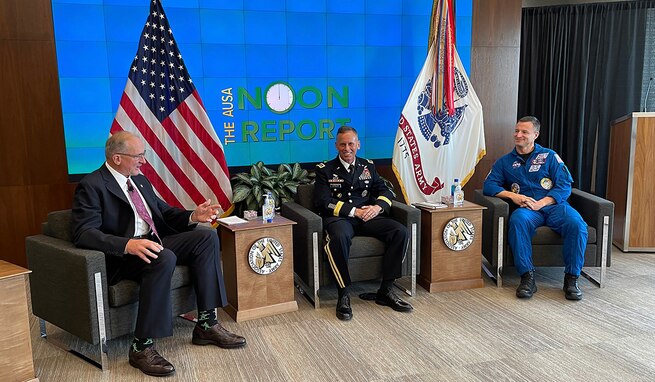 Retired Gen. Robert B. Brown, left, Association of the U.S. Army executive vice president, speaks with Lt. Gen. Daniel L. Karbler, commanding general, U.S. Army Space and Missile Defense Command, and Col. Andrew R. “Drew” Morgan, U.S. Army NASA Astronaut Detachment commander, at AUSA Noon Report, May 4, to discuss how Army space contributes to a multi-domain operations force. (U.S. Army photo by Lira Frye)