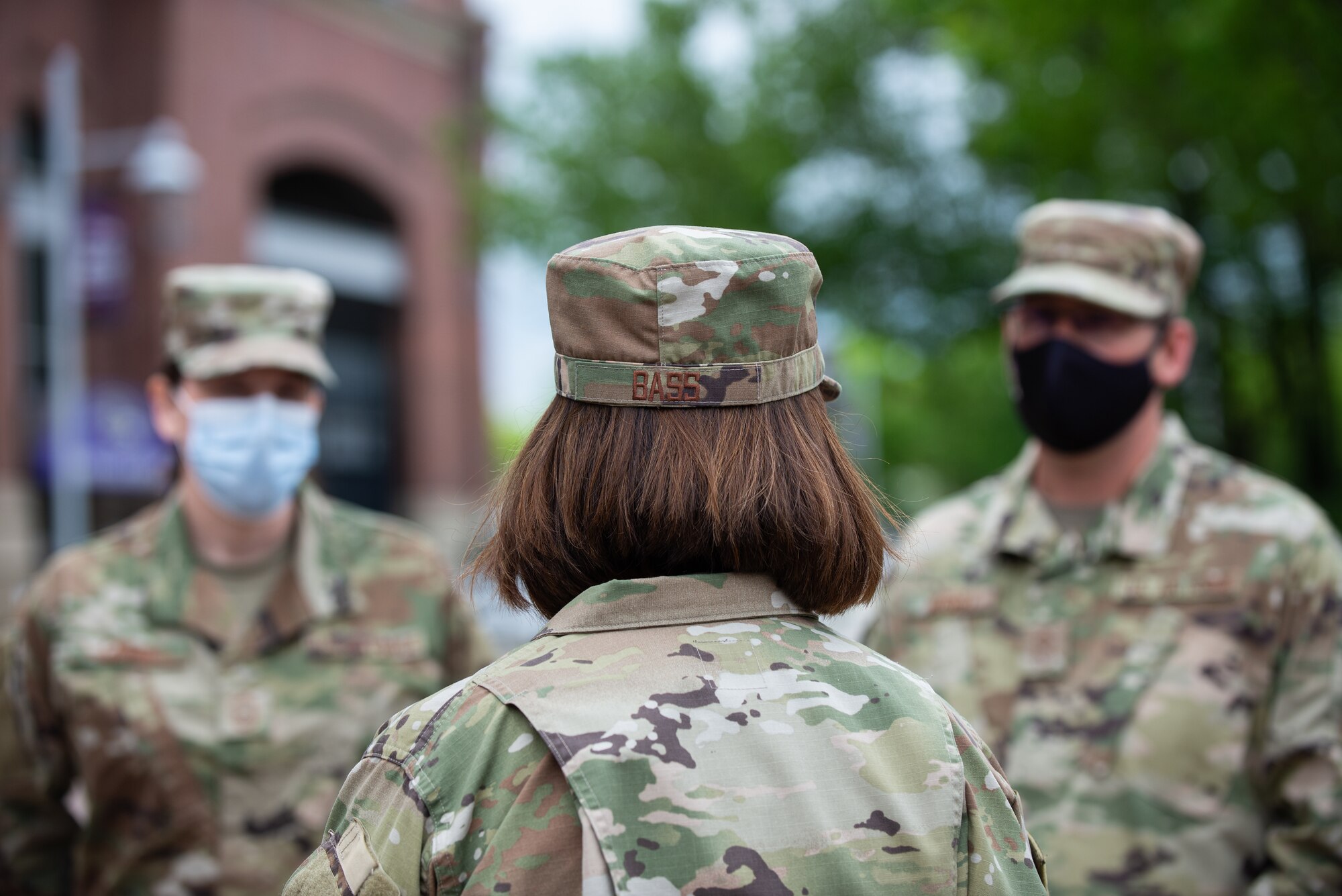 Chief Master Sgt. of the Air Force JoAnne S. Bass speaks to Airmen of the 175th Wing, Maryland National Guard, while visiting the mass vaccination site at M&T Bank Stadium, Baltimore, on May 3, 2021.