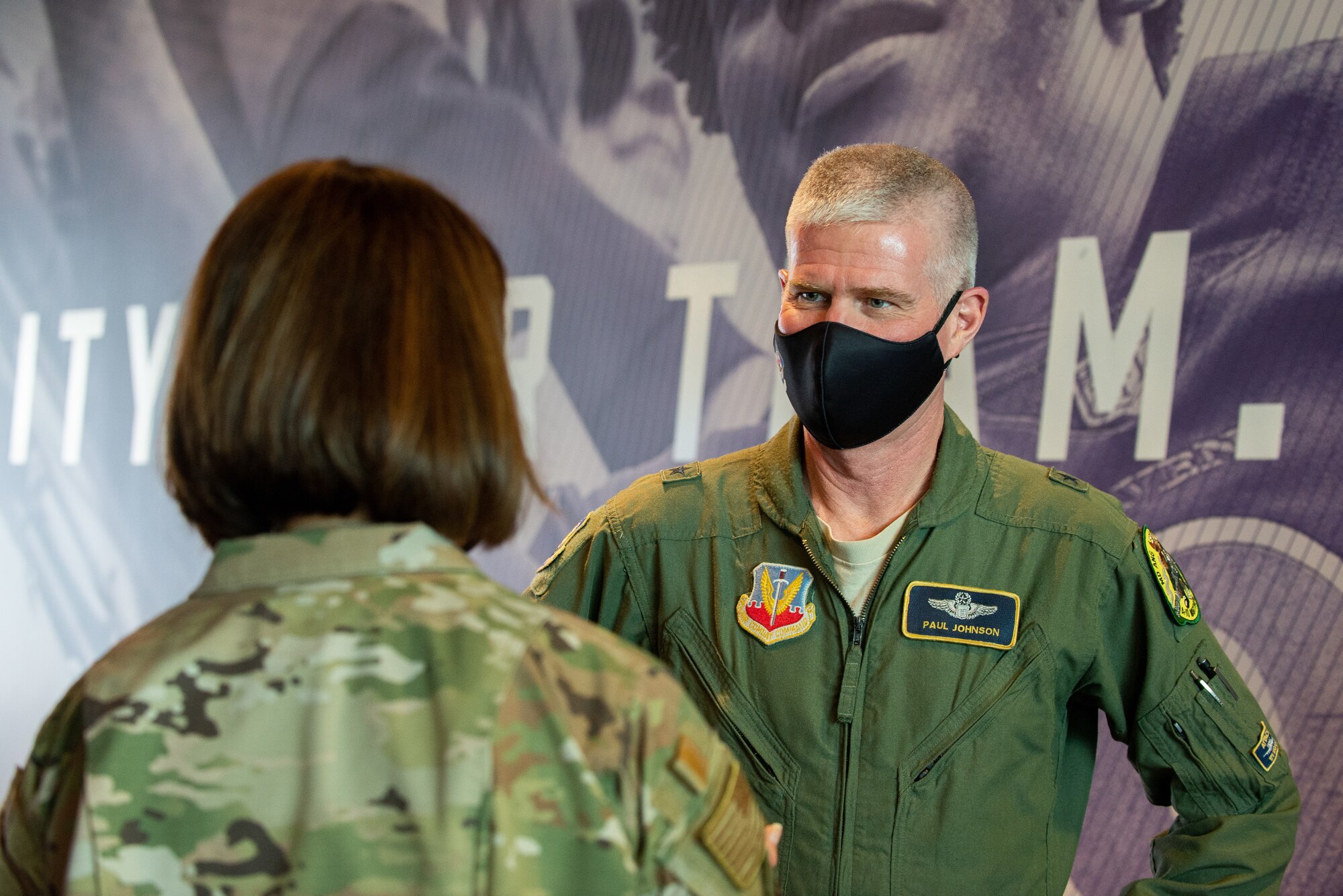 U.S. Air Force Brig. Gen. Paul Johnson, commander of the 175th Wing, speaks to Chief Master Sgt. of the Air Force JoAnne S. Bass at M&T Bank Stadium, Baltimore, on May 3, 2021.