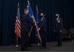 U.S. Air Force Brig. Gen. Jeannine Ryder, 59th Medical Wing commander, assumes command of the 59th MDW with a ceremonial hand-off of the unit guidon from U.S. Air Force Lt. Gen. Marshall B. Webb, commander of Air Education and Training Command, during a change of command ceremony at the Inter-American Air Forces Academy, Joint Base San Antonio-Lackland, April 29, 2021.