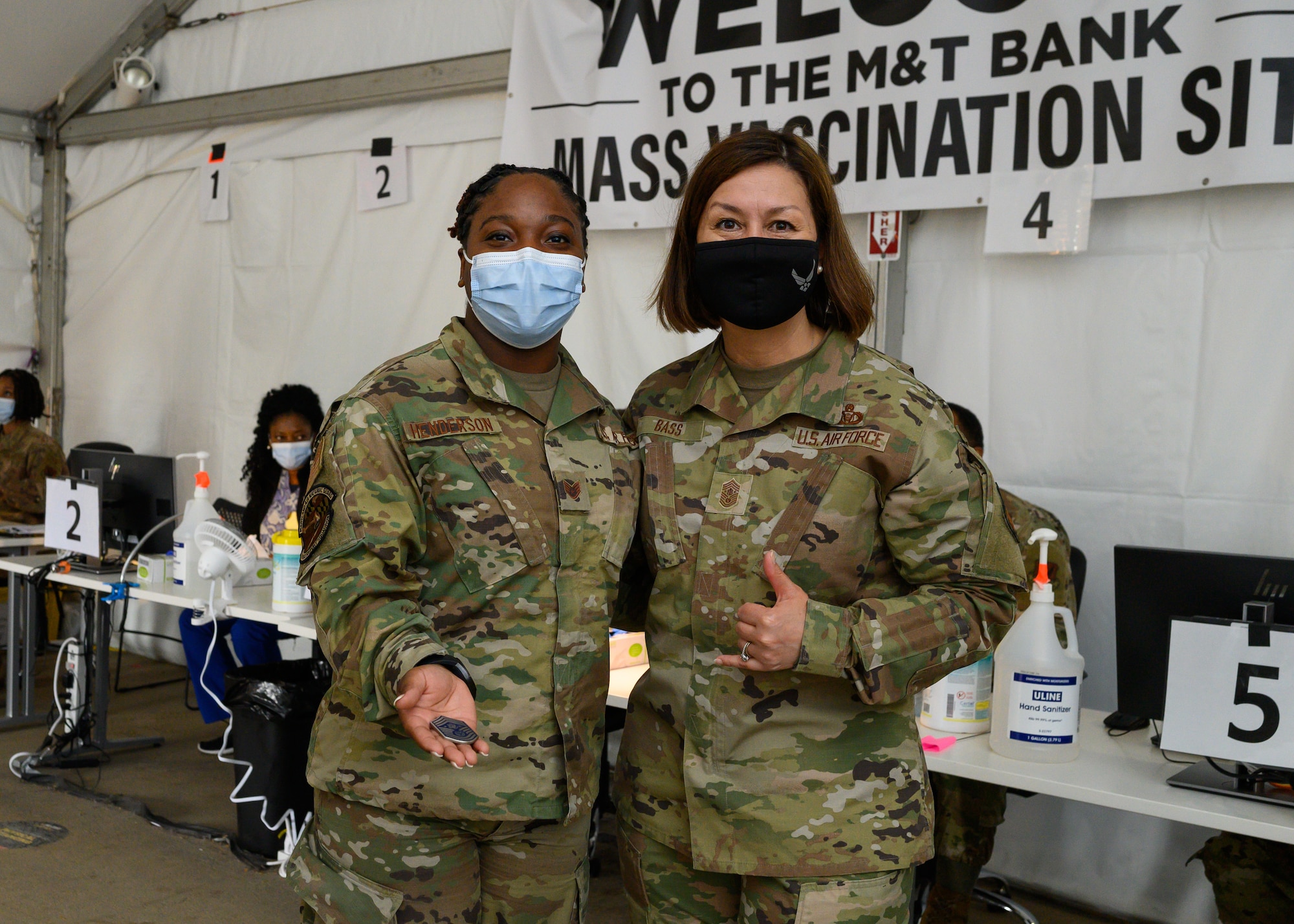 Chief Master Sgt. of the Air Force JoAnne S. Bass poses for a portrait with SStaff Sgt. Clarissa Henderson, a food services supervisor assigned to the 175th Force Support Squadron, 175th Wing, at the mass vaccination site at M&T Bank Stadium, Baltimore, on May 3, 2021.