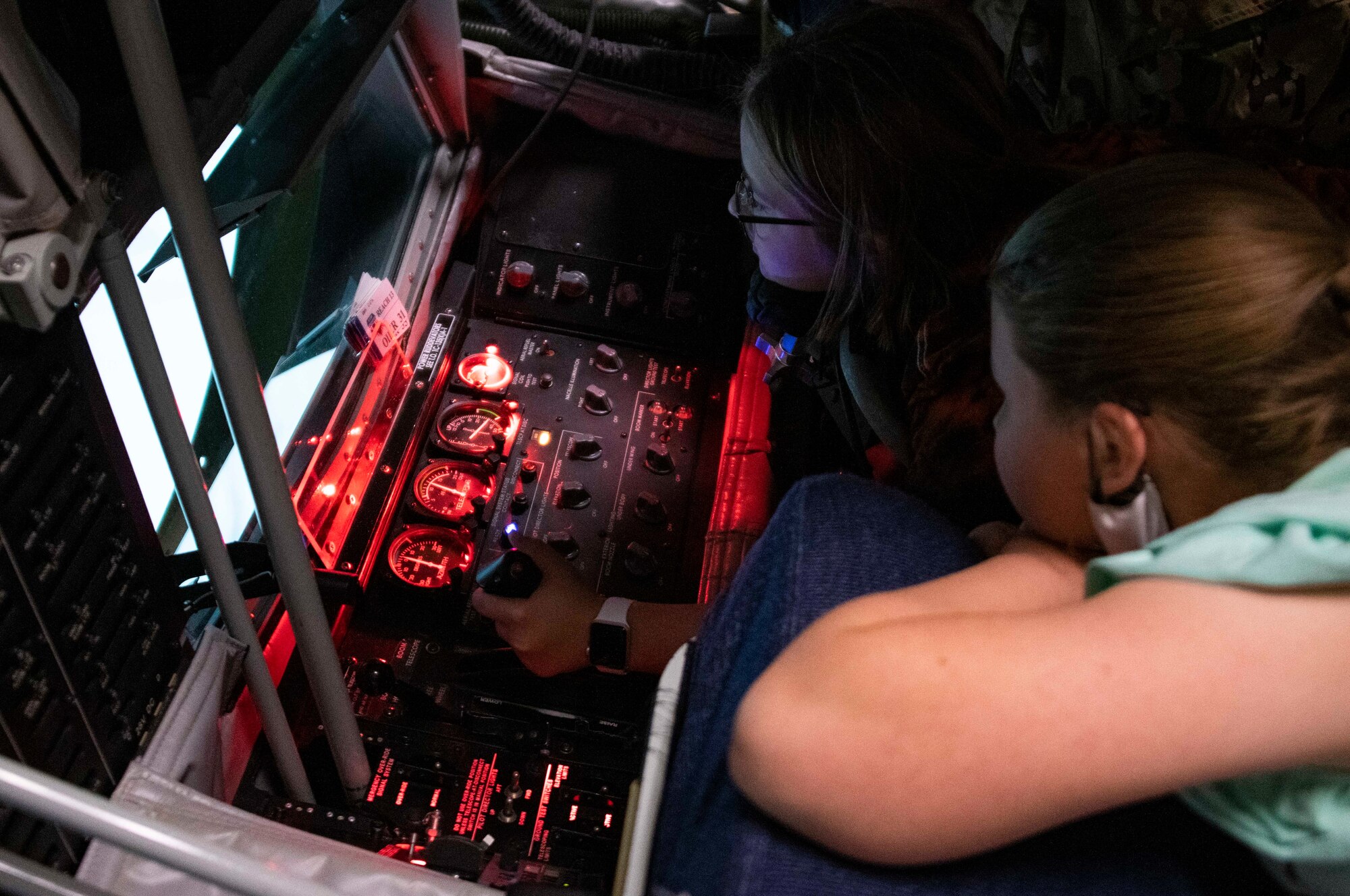 children operate a simulator.