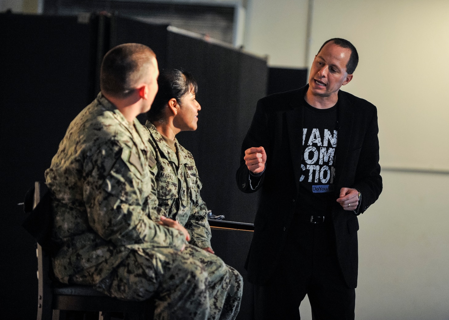 Mike Domitrz, right, delivers the interactive show "Can I Kiss You?" to service members at Camp Lemonnier, Djibouti on March 6, 2014.