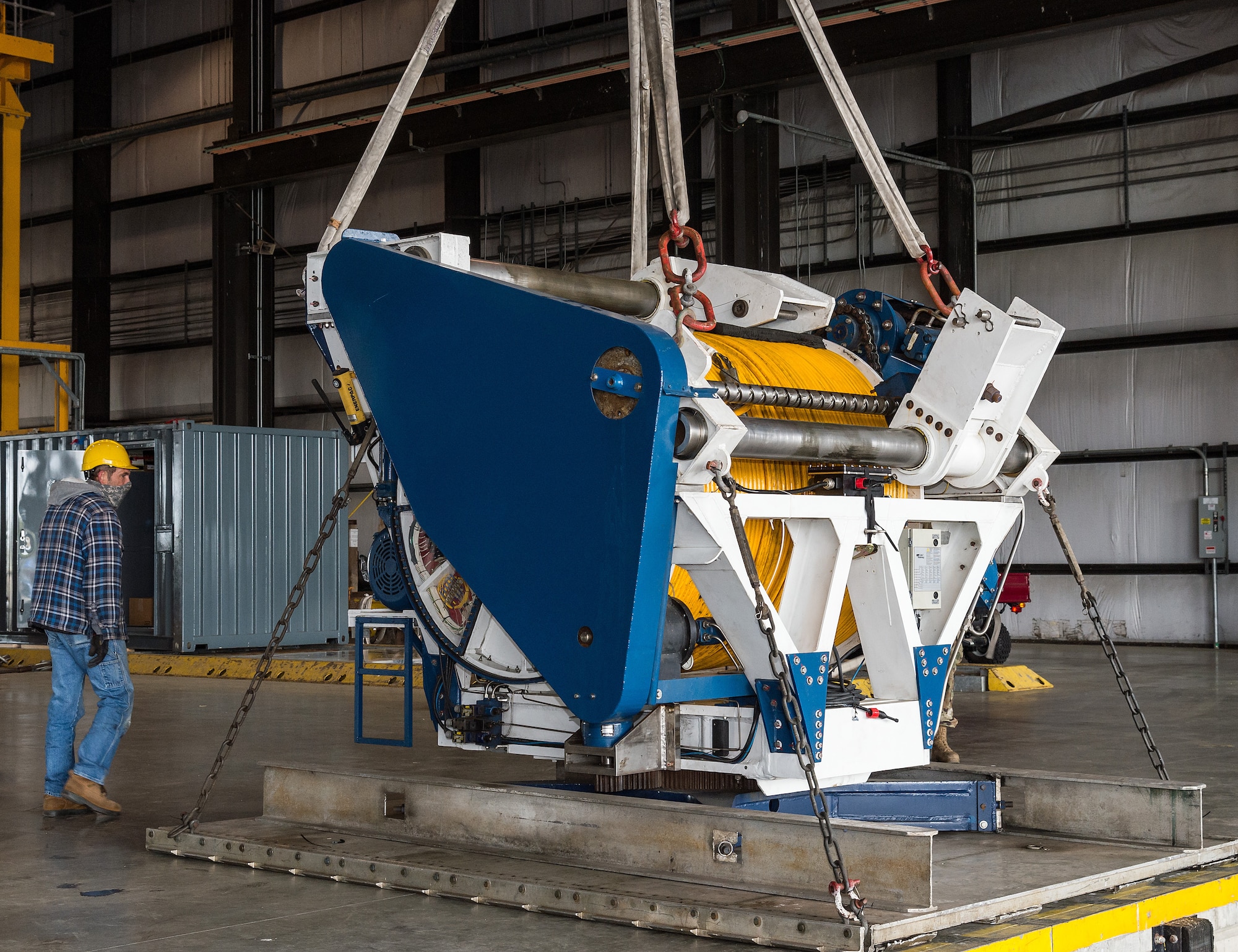 Members of the 436th Aerial Port Squadron unload cargo at Dover Air Force Base, Delaware, April 22, 2021. The cargo was flown to Indonesia to support search and rescue efforts for an Indonesian navy submarine. Indonesia is a vital partner in the Indo-Pacific region. (U.S. Air Force photo by Roland Balik)