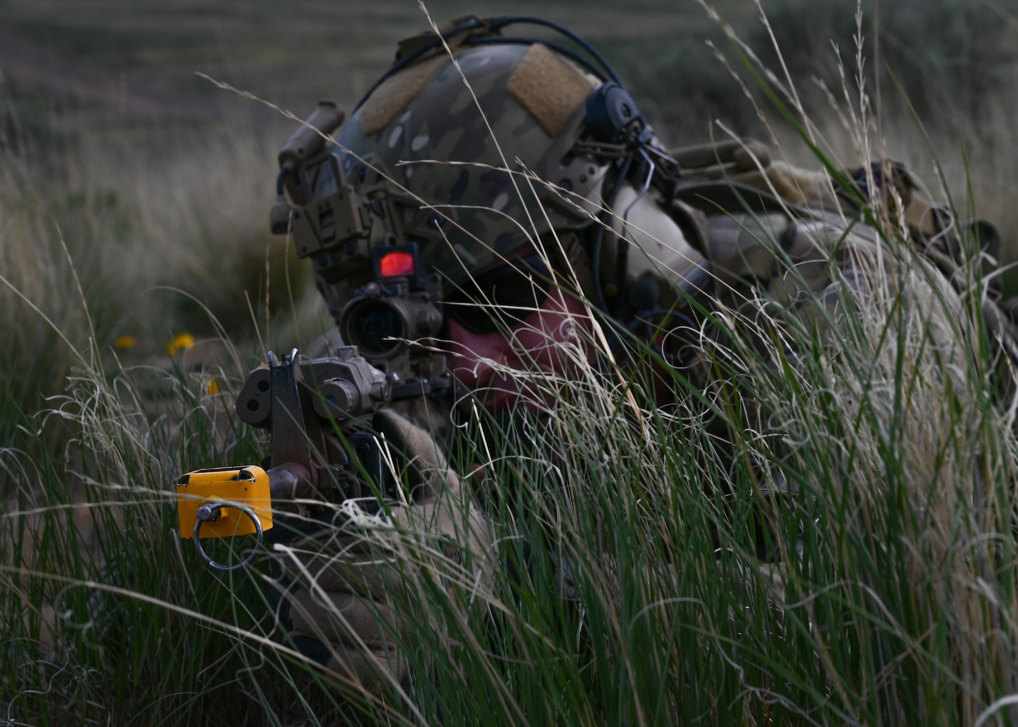 A U.S. Air Force tactical air control party Airman with the 5th Air Support Operations Squadron holds his position during a small unit tactics exercise at Yakima Training Center, Washington, April 28, 2021. Small unit tactics are used for the combat deployment of platoons in a particular strategic and logistic environment. (U.S. Air Force photo by Airman 1st Class Callie Norton)