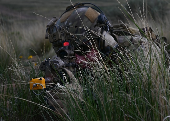 A U.S. Air Force tactical air control party Airman with the 5th Air Support Operations Squadron holds his position during a small unit tactics exercise at Yakima Training Center, Washington, April 28, 2021. Small unit tactics are used for the combat deployment of platoons in a particular strategic and logistic environment. (U.S. Air Force photo by Airman 1st Class Callie Norton)