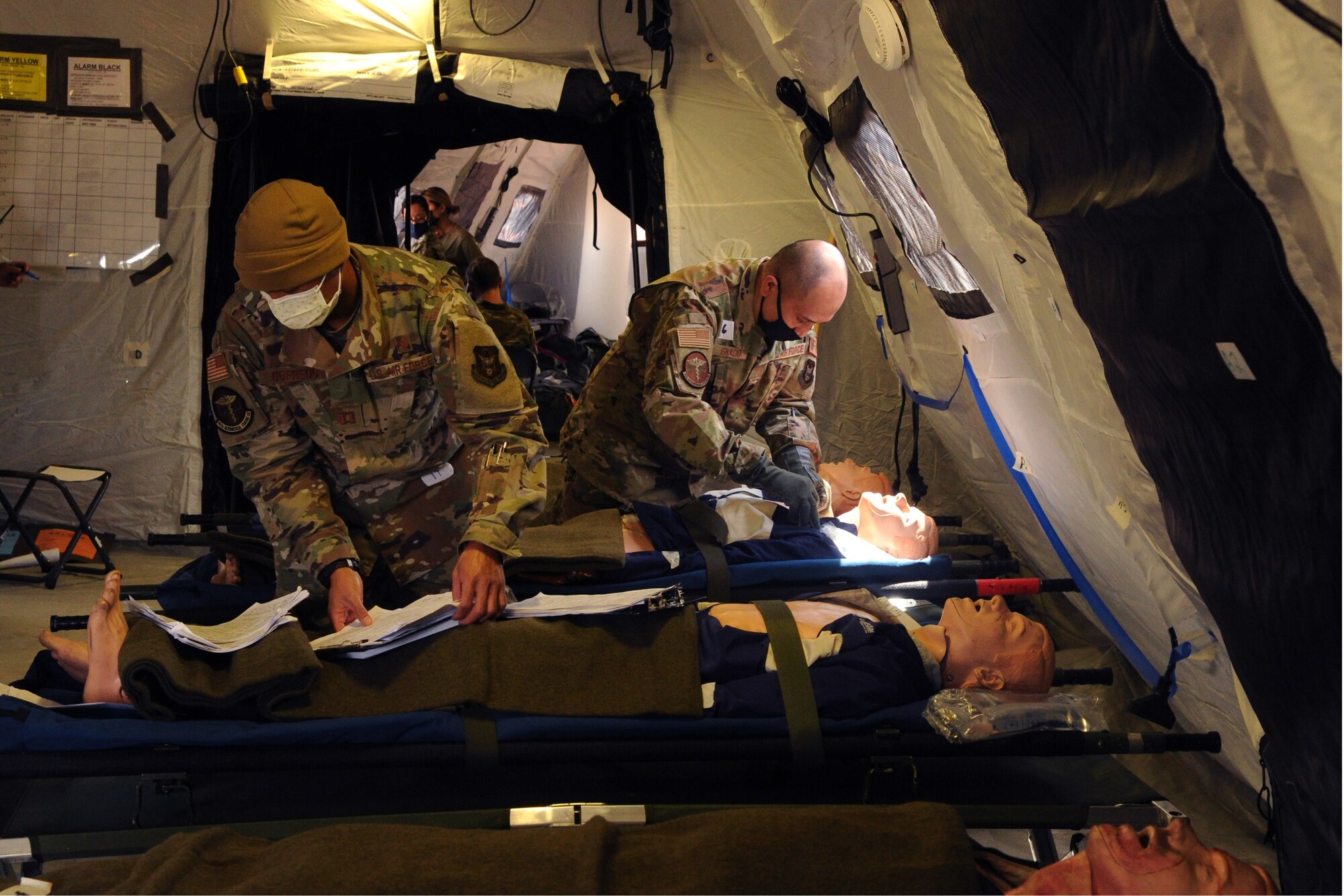 Image of two Airmen working
