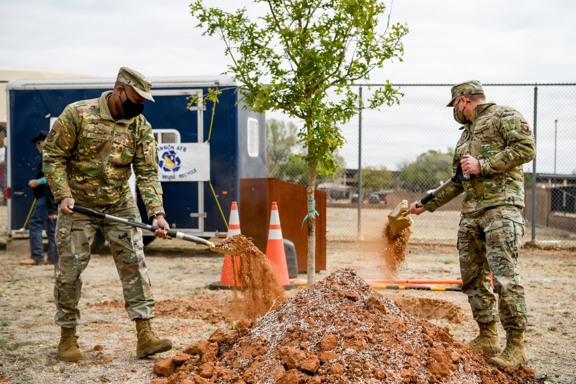 The 27th Special Operations Wing commander, Col. Robert A. Masaitis, signs into effect Arbor Day ceremony at Cannon Air Force Base, N.M., on April 26, 2021. The tree planting ceremony highlights the goal of building a sustainable future. (U.S. Air Force photo by Senior Airman Marcel Williams)