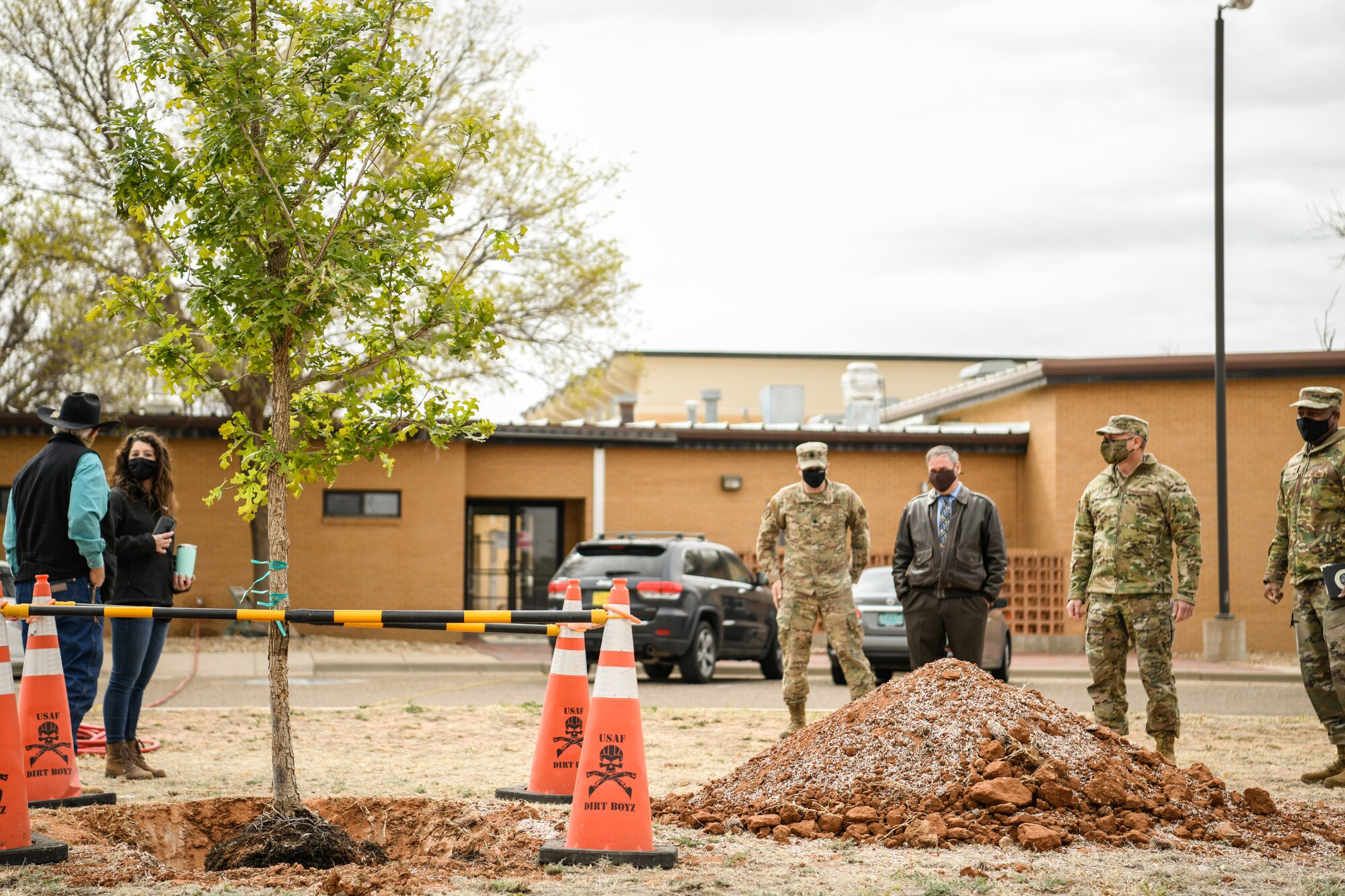 The 27th Special Operations Wing commander, Col. Robert A. Masaitis, signs into effect Arbor Day ceremony at Cannon Air Force Base, N.M., on April 26, 2021. The tree planting ceremony highlights the goal of building a sustainable future. (U.S. Air Force photo by Senior Airman Marcel Williams)
