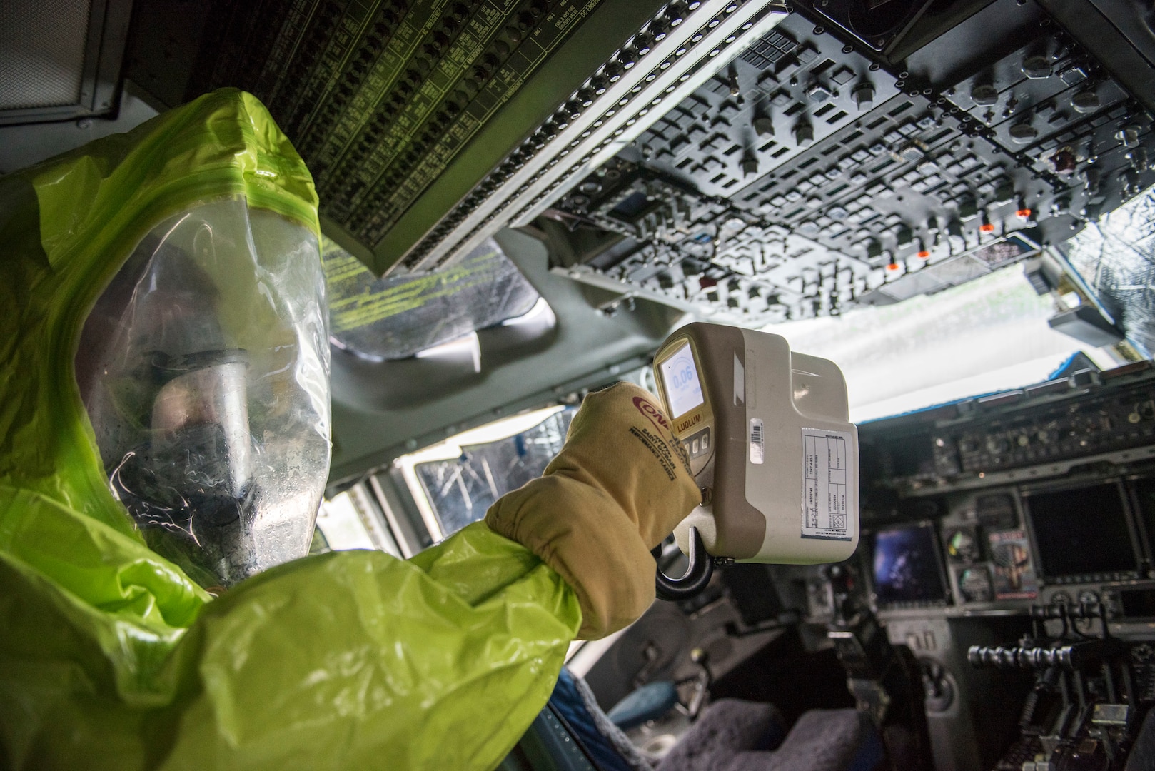 U.S. Air Force Staff Sgt. Austin Lloyd, 167th Airlift Wing firefighter, uses a gamma detector in the cockpit of a C-17 Globemaster III aircraft, during a Counter CBRN (Chemical, Biological, Radiological, and Nuclear) All-Hazard Management Response, or CAMR, exercise at the 167th AW, Martinsburg, West Virginia, April 30, 2021. CAMR is a hybrid program of classroom lecture, discussion and tabletop exercises that culminate in a full scale emergency response exercise.