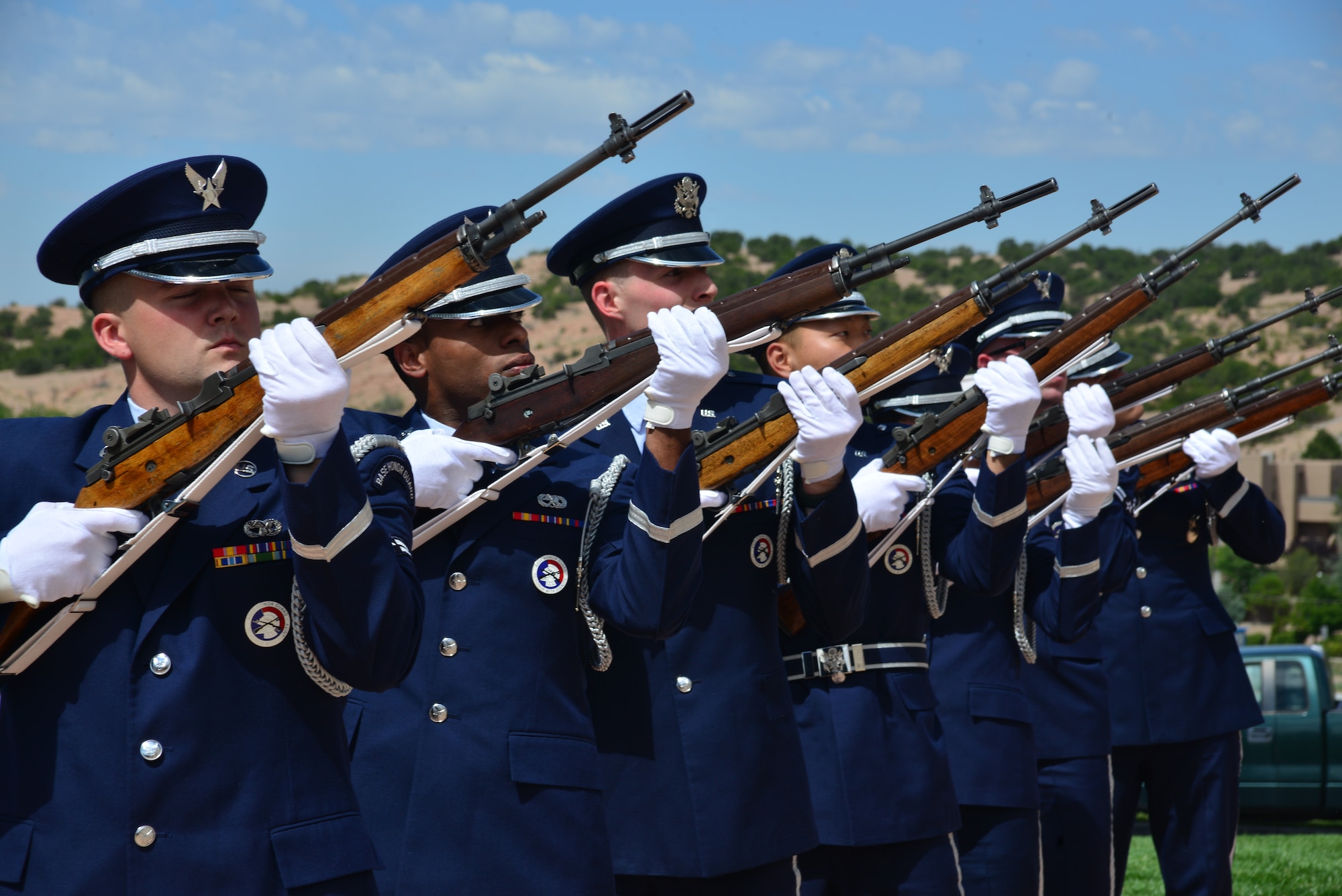Military members render funeral honors to a deceased veteran.