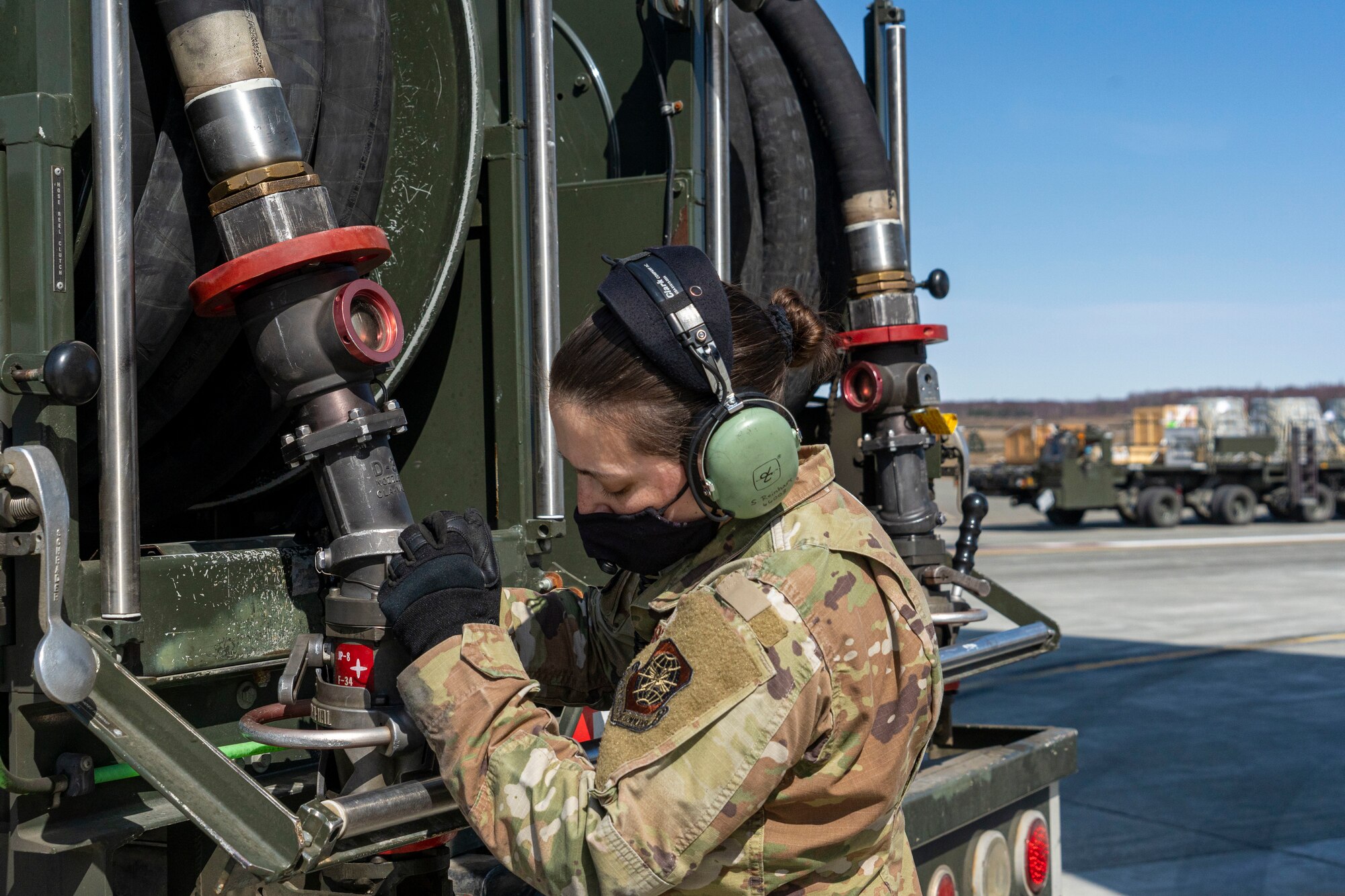 U.S. Air Force Tech. Sgt. Sarah Reinhart, a member of the 732d Air Mobility Squadron, secures a fuel nozzle onto an R-11 refueler after refueling a C-17 Globemaster III assigned to Joint Base Lewis-McChord, Washington, on the flightline at Joint Base Elmendorf-Richardson, Alaska, May 1, 2021, in support of Northern Edge 2021. Approximately 15,000 U.S. service members are participating in a joint training exercise hosted by U.S. Pacific Air Forces May 3-14, 2021, on and above the Joint Pacific Alaska Range Complex, the Gulf of Alaska, and temporary maritime activities area. NE21 is one in a series of U.S. Indo-Pacific Command exercises designed to sharpen the joint forces’ skills; to practice tactics, techniques, and procedures; to improve command, control and communication relationships; and to develop cooperative plans and programs.