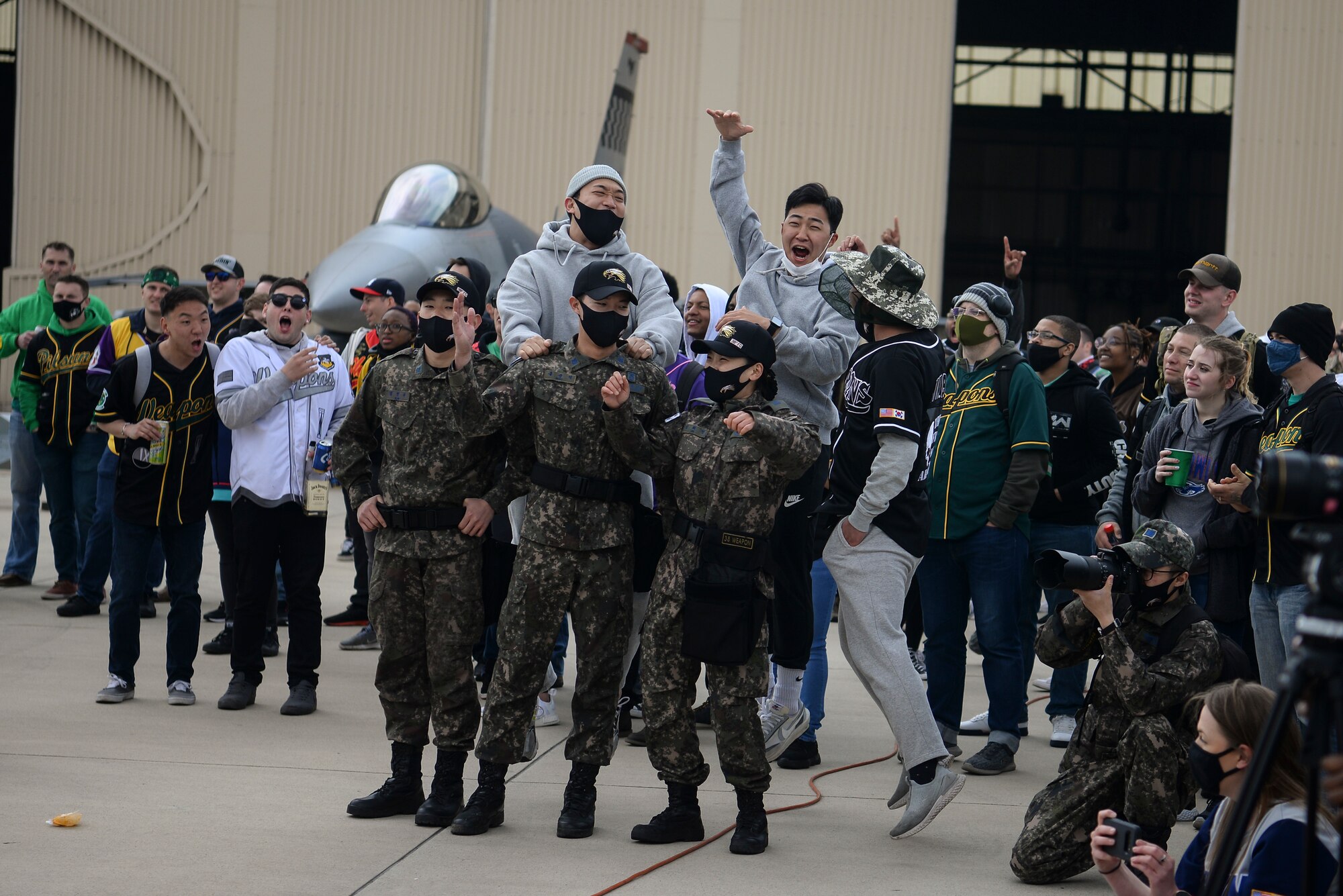U.S. and Republic of Korean airmen celebrate during a competition.
