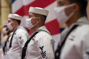 Sailors stand at attention during a change of command ceremony for U.S. Naval Forces Central Command (NAVCENT), U.S. 5th Fleet and Combined Maritime Forces (CMF) onboard Naval Support Activity Bahrain, May 5. Vice Adm. Sam Paparo was relieved by Vice Adm. Brad Cooper. NAVCENT is the U.S Navy element of U.S. Central Command in the U.S. 5th Fleet area of operations and encompasses about 2.5 million square miles of water area and includes the Arabian Gulf, Gulf of Oman, Red Sea and parts of the Indian Ocean. The expanse is comprised of 20 countries and includes three critical choke points at the Strait of Hormuz, the Suez Canal and the Strait of Bab al Mandeb at the southern tip of Yemen.