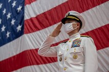Vice Adm. Brad Cooper salutes during a change of command ceremony for U.S. Naval Forces Central Command (NAVCENT), U.S. 5th Fleet and Combined Maritime Forces (CMF) onboard Naval Support Activity Bahrain, May 5. Vice Adm. Sam Paparo was relieved by Cooper. NAVCENT is the U.S. Navy element of U.S. Central Command in the U.S. 5th Fleet area of operations and encompasses about 2.5 million square miles of water area and includes the Arabian Gulf, Gulf of Oman, Red Sea and parts of the Indian Ocean. The expanse is comprised of 20 countries and includes three critical choke points at the Strait of Hormuz, the Suez Canal and the Strait of Bab al Mandeb at the southern tip of Yemen.