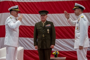 Vice Adm. Sam Paparo, left, commander, U.S. Naval Forces Central Command (NAVCENT), U.S. 5th Fleet and Combined Maritime Forces (CMF), is relieved by Vice Adm. Brad Cooper, right, during a change of command ceremony presided over by Gen. Frank McKenzie, commander of U.S. Central Command, onboard Naval Support Activity Bahrain, May 5. NAVCENT is the U.S. Navy element of U.S. Central Command in the U.S. 5th Fleet area of operations and encompasses about 2.5 million square miles of water area and includes the Arabian Gulf, Gulf of Oman, Red Sea and parts of the Indian Ocean. The expanse is comprised of 20 countries and includes three critical choke points at the Strait of Hormuz, the Suez Canal and the Strait of Bab al Mandeb at the southern tip of Yemen.
