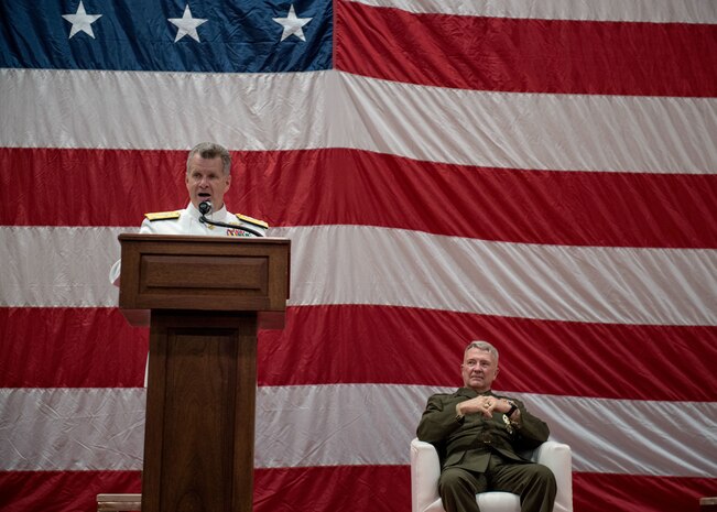 Gen. Frank McKenzie, right, commander of U.S. Central Command, listens to remarks given by Vice Adm. Sam Paparo, commander, U.S. Naval Forces Central Command (NAVCENT), U.S. 5th Fleet and Combined Maritime Forces (CMF), as he delivers remarks during a change of command ceremony onboard Naval Support Activity Bahrain, May 5. Paparo was relieved by Vice Adm. Brad Cooper. NAVCENT is the U.S. Navy element of U.S. Central Command in the U.S. 5th Fleet area of operations and encompasses about 2.5 million square miles of water area and includes the Arabian Gulf, Gulf of Oman, Red Sea and parts of the Indian Ocean. The expanse is comprised of 20 countries and includes three critical choke points at the Strait of Hormuz, the Suez Canal and the Strait of Bab al Mandeb at the southern tip of Yemen.