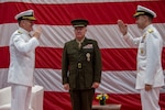 Vice Adm. Sam Paparo, left, commander, U.S. Naval Forces Central Command (NAVCENT), U.S. 5th Fleet and Combined Maritime Forces (CMF), is relieved by Vice Adm. Brad Cooper, right, during a change of command ceremony presided over by Gen. Frank McKenzie, commander of U.S. Central Command, onboard Naval Support Activity Bahrain, May 5. NAVCENT is the U.S. Navy element of U.S. Central Command in the U.S. 5th Fleet area of operations and encompasses about 2.5 million square miles of water area and includes the Arabian Gulf, Gulf of Oman, Red Sea and parts of the Indian Ocean. The expanse is comprised of 20 countries and includes three critical choke points at the Strait of Hormuz, the Suez Canal and the Strait of Bab al Mandeb at the southern tip of Yemen.