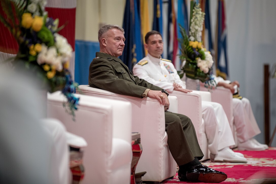Gen. Frank McKenzie, commander of U.S. Central Command, center, and Vice Adm. Brad Cooper, incoming commander U.S. Naval Forces Central Command (NAVCENT), U.S. 5th Fleet and Combined Maritime Forces (CMF) listens to remarks during a change of command ceremony onboard Naval Support Activity Bahrain, May 5. Vice Adm. Sam Paparo was relieved by Cooper. NAVCENT is the U.S. Navy element of U.S. Central Command in the U.S. 5th Fleet area of operations and encompasses about 2.5 million square miles of water area and includes the Arabian Gulf, Gulf of Oman, Red Sea and parts of the Indian Ocean. The expanse is comprised of 20 countries and includes three critical choke points at the Strait of Hormuz, the Suez Canal and the Strait of Bab al Mandeb at the southern tip of Yemen.