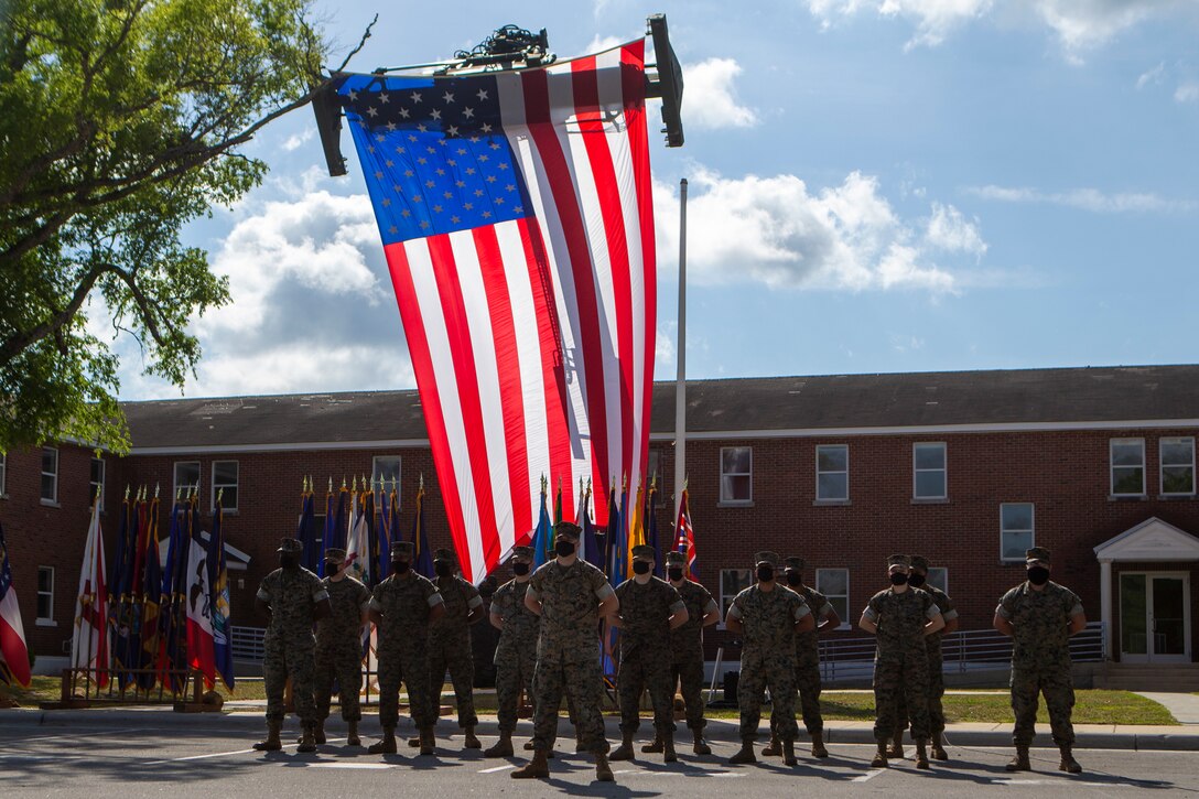 U.S. Marines with 2d Tank Battalion, 2d Marine Division (2d MARDIV), participate in a deactivation ceremony on Camp Lejeune, N.C., May 5, 2021. This is the next step towards 2d MARDIV’s optimization for future conflicts against peer threats in accordance with the 38th Commandant's Planning Guidance and Force Design 2030. (U.S. Marine Corps photo by Pfc. Sarah Pysher)