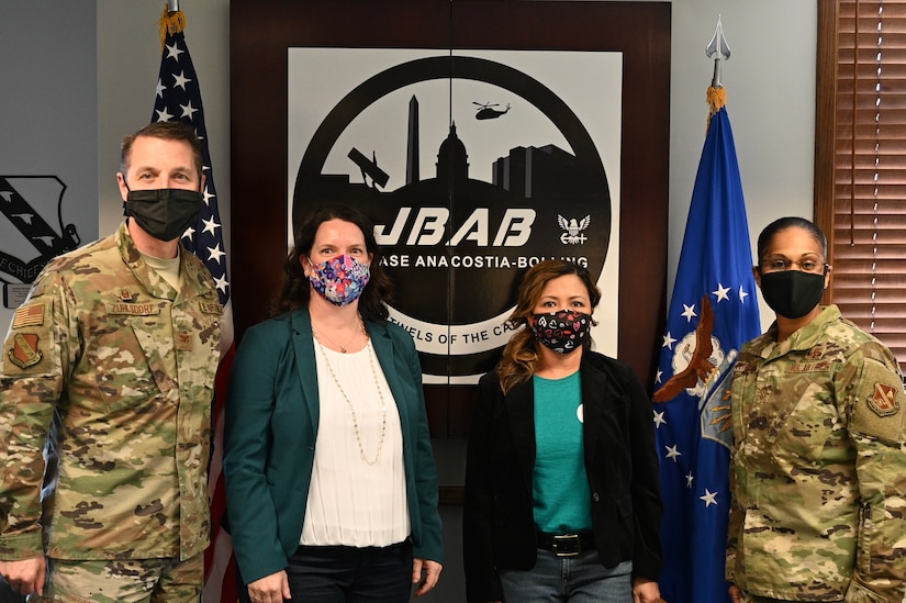 U.S. Air Force Col. Michael Zuhlsdorf, Joint Base Anacostia-Bolling and 11th Wing commander, Amy Nowak, Joint Base Anacostia-Bolling Sexual Assault Response Coordinator, Gina Rodriguez, Joint Base Anacostia-Bolling Sexual Assault Prevention and Response Victim Advocate, and Chief Master Sgt. Christy Peterson, Joint Base Anacostia-Bolling’s command chief master sergeant, pose for a picture after the leadership team’s signing of the Sexual Assault Awareness and Prevention Month Proclamation at Joint Base Anacostia-Bolling, Washington DC, April 5, 2021.
The Sexual Assault Prevention and Response team on Joint Base Anacostia-Bolling provides victim support and resources, civilian and military training, and community awareness. Sexual Assault Awareness and Prevention Month is commemorated every April, and annual events are organized by the SAPR office. This year’s events include a virtual fun run, a calendar of daily reflections, and a proclamation signed by 11WG leadership, which will travel throughout the installation where passersby may add their signatures and support. (U.S. Air Force  photo by Technical Sgt. Katie Edelman)