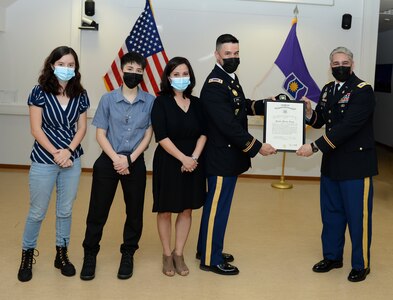 Army Reserve Officer promotes in Germany