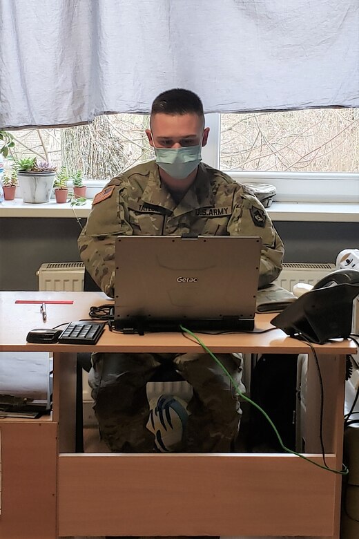 Sgt. Bradley Taylor, a medic with the Pennsylvania National Guard's 108th Medical Company Area Support, works in his office on a Lithuanian Army base in Marijampole, Lithuania, where he is providing medical support to U.S and Lithuanian troops. The 108th MCAS deployed to Europe in late February to provide medical support to U.S. and allied rotational forces in the region.