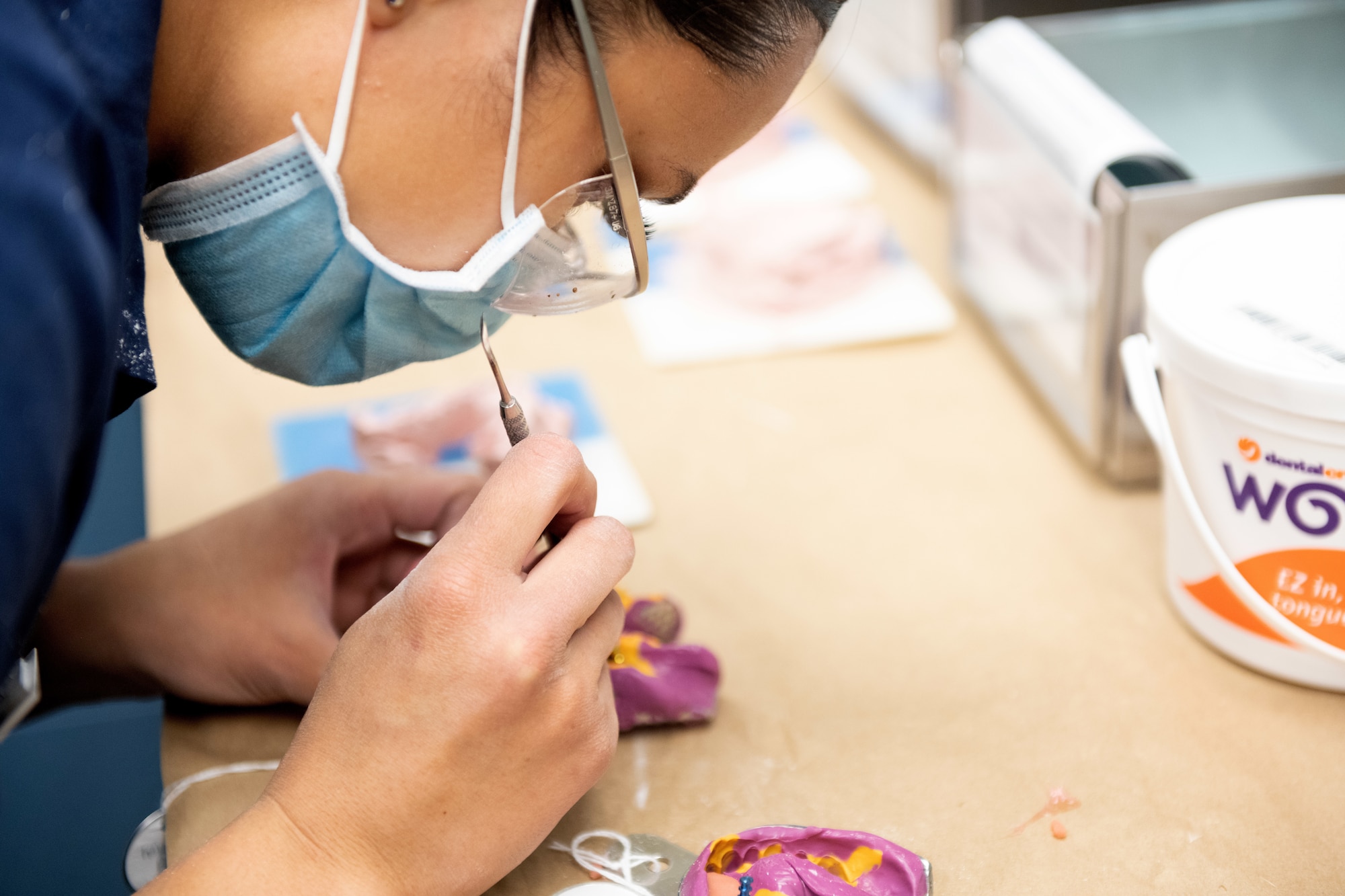 Photos of Airmen working inside the 60th Dental Squadron at Travis AFB